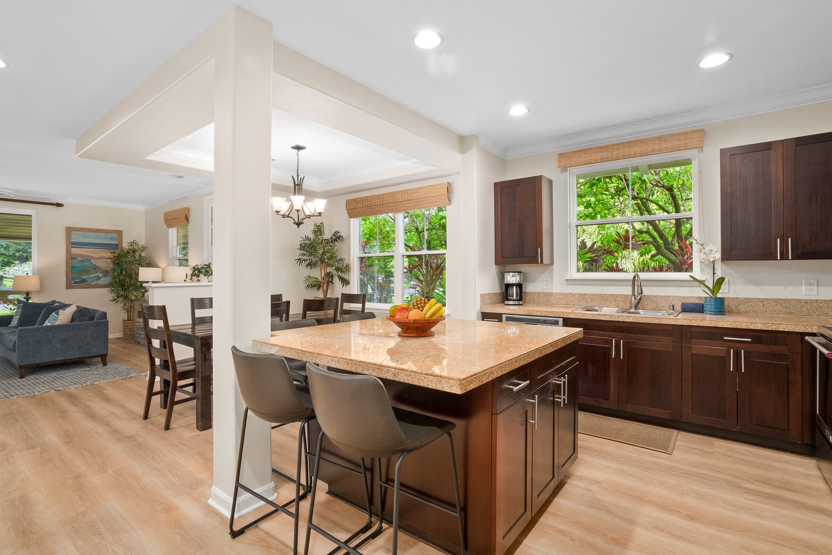 Princeville Vacation Rentals, Hale Kaua'i - The open kitchen layout keeps everyone connected from breakfast through evening gatherings.