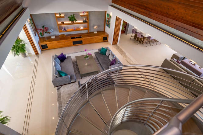 Honolulu Vacation Rentals, Diamond Head Beachfront Estate - Bird’s-eye view of the formal living room—spacious, stylish, and designed for connection.