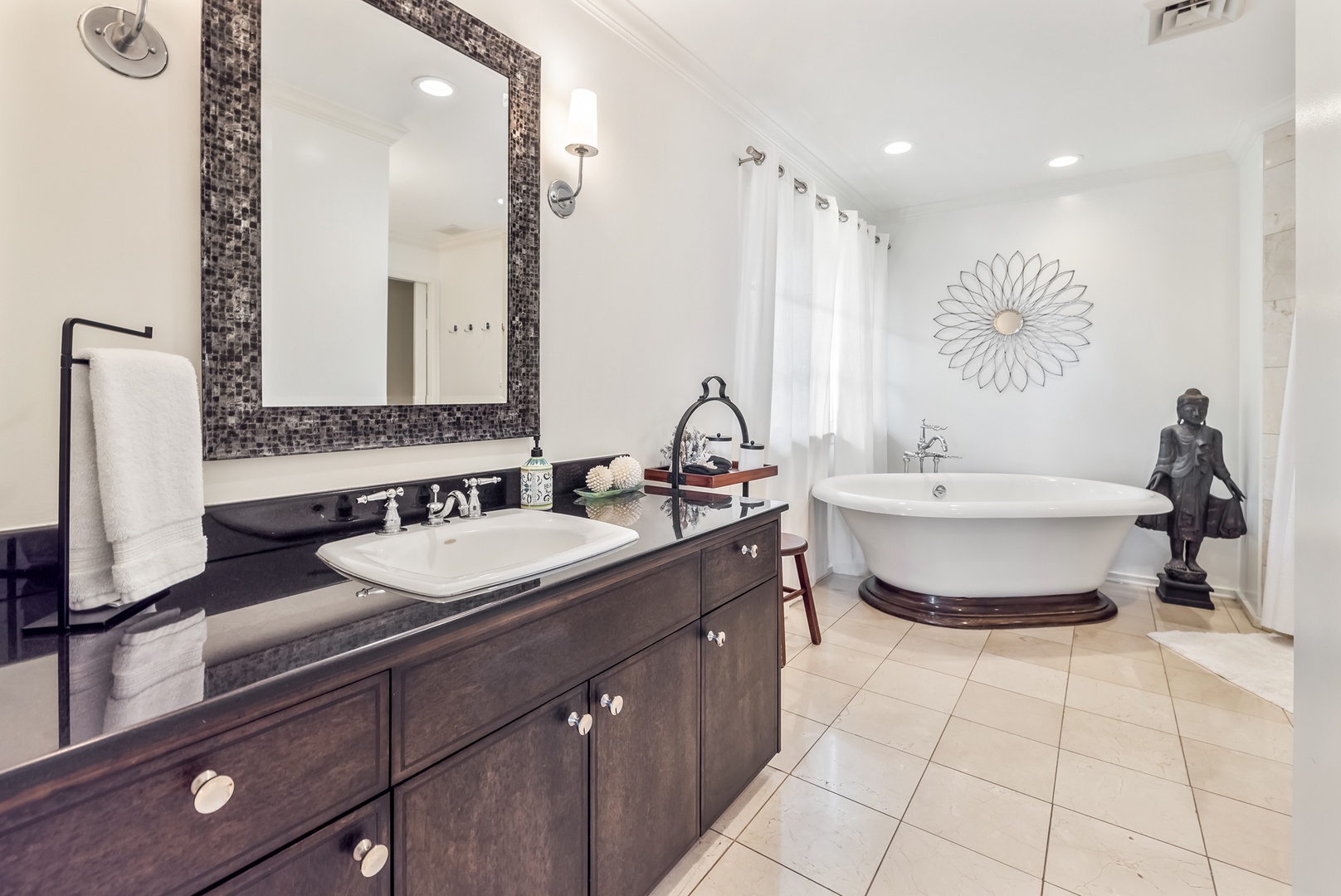 Honolulu Vacation Rentals, Moana Lani - Main House - Freestanding soaking tub by the window, ready for the end of a long beach day.