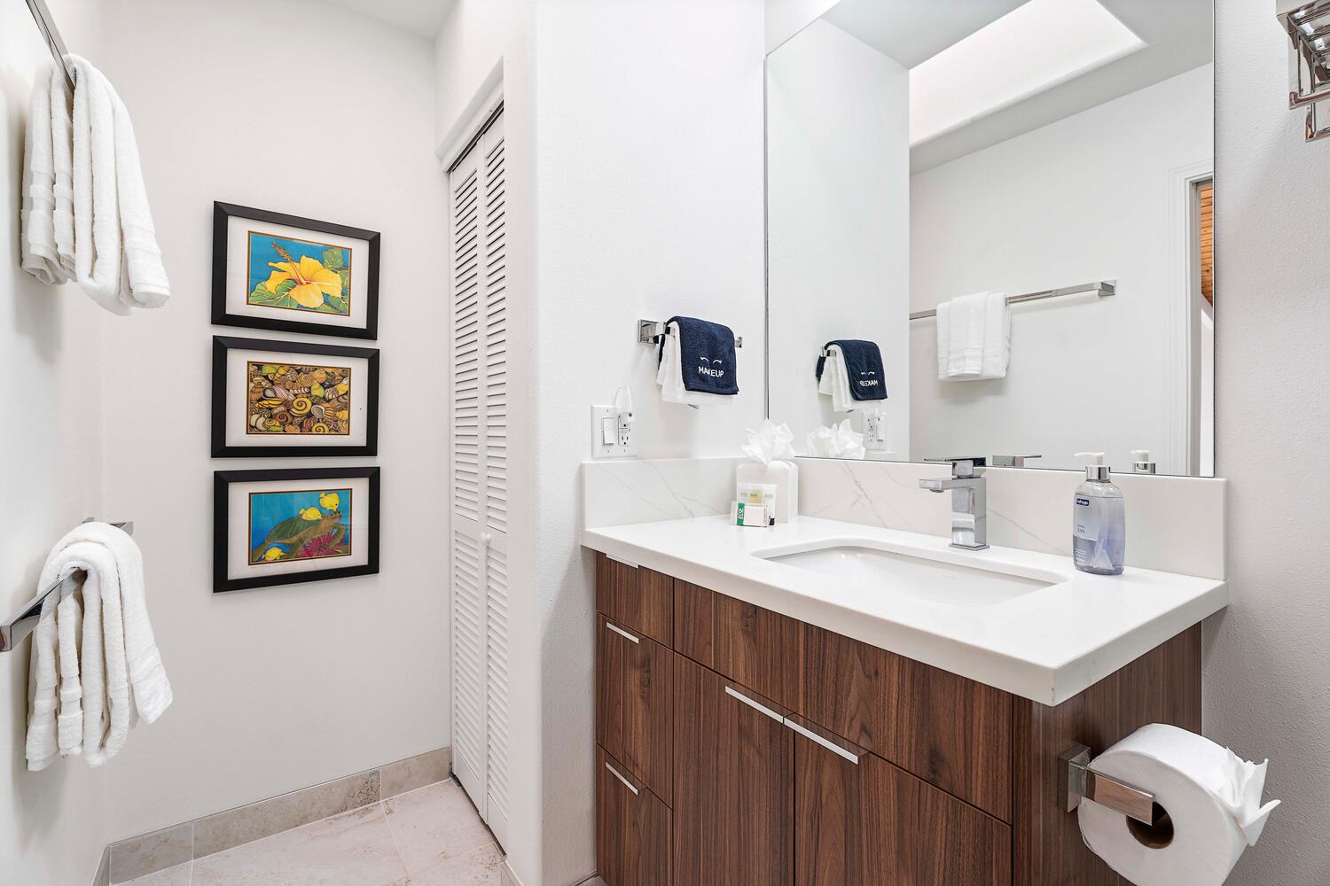 Kailua Kona Vacation Rentals, Ho'okipa Hale - Single-sink guest bathroom with ample vanity space and modern fixtures.