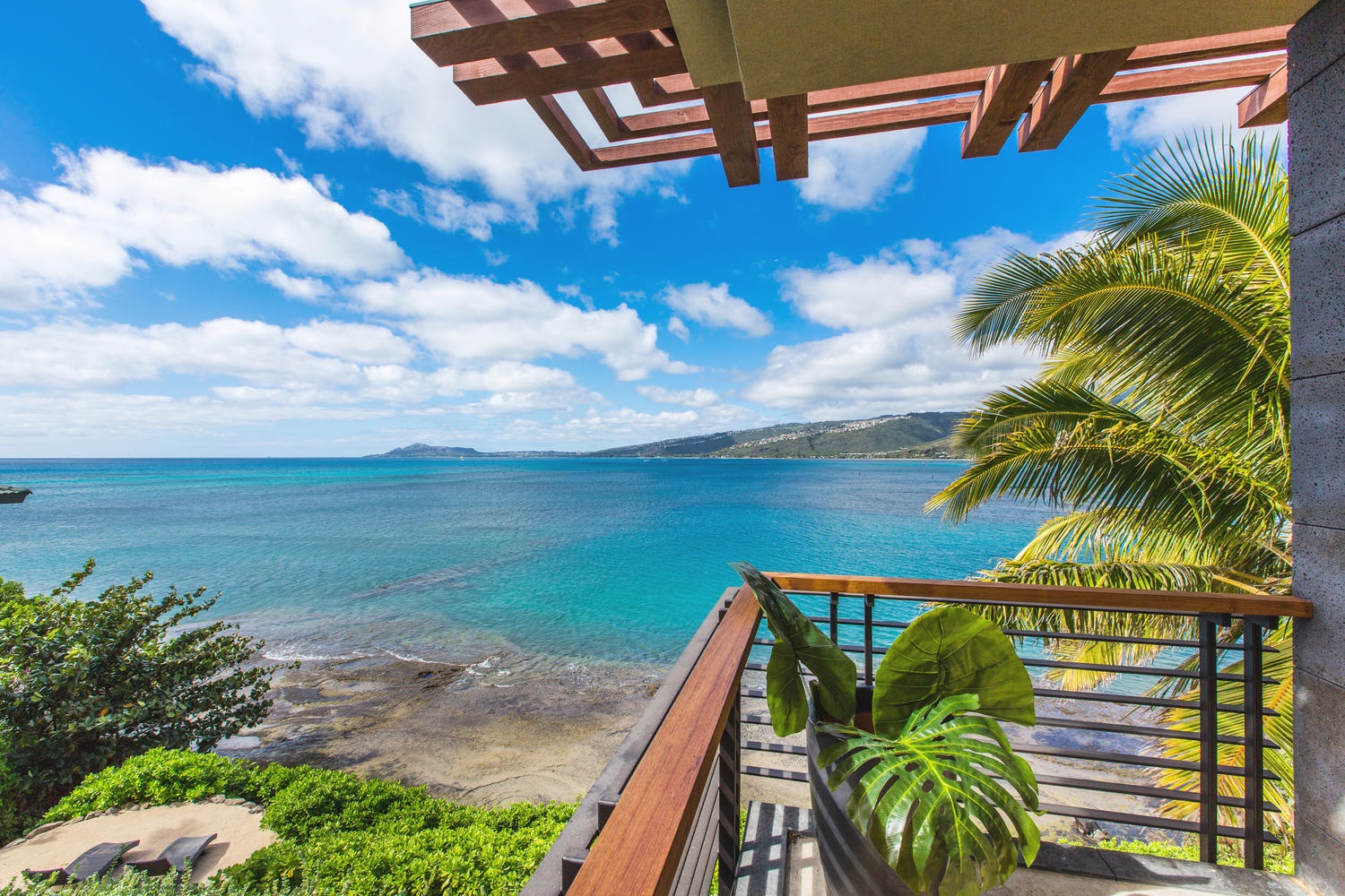 Honolulu Vacation Rentals, Maunalua Bay Estate - Primary bedroom lanai views.
