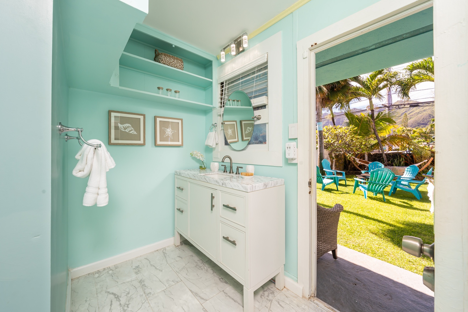 Hauula Vacation Rentals, Private Beach Paradise - A bathroom door that opens straight to the green of the yard.