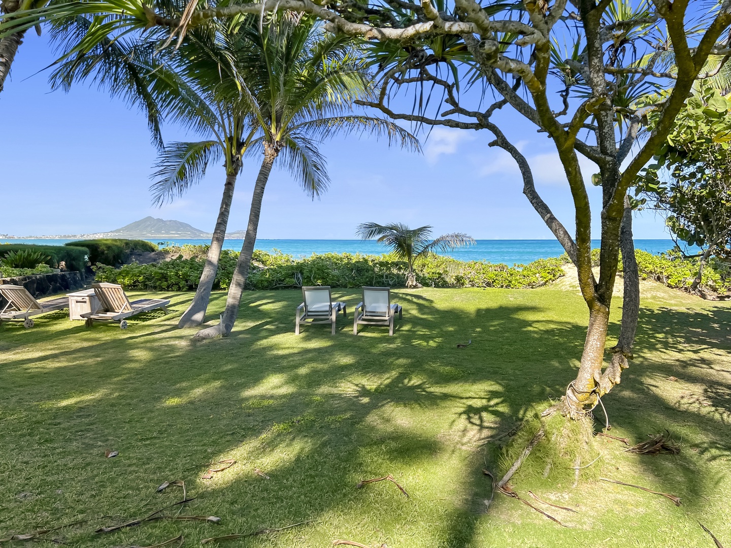 Kailua Vacation Rentals, Kai Mele - Enjoy views of the tropical landscape and ocean from the front porch