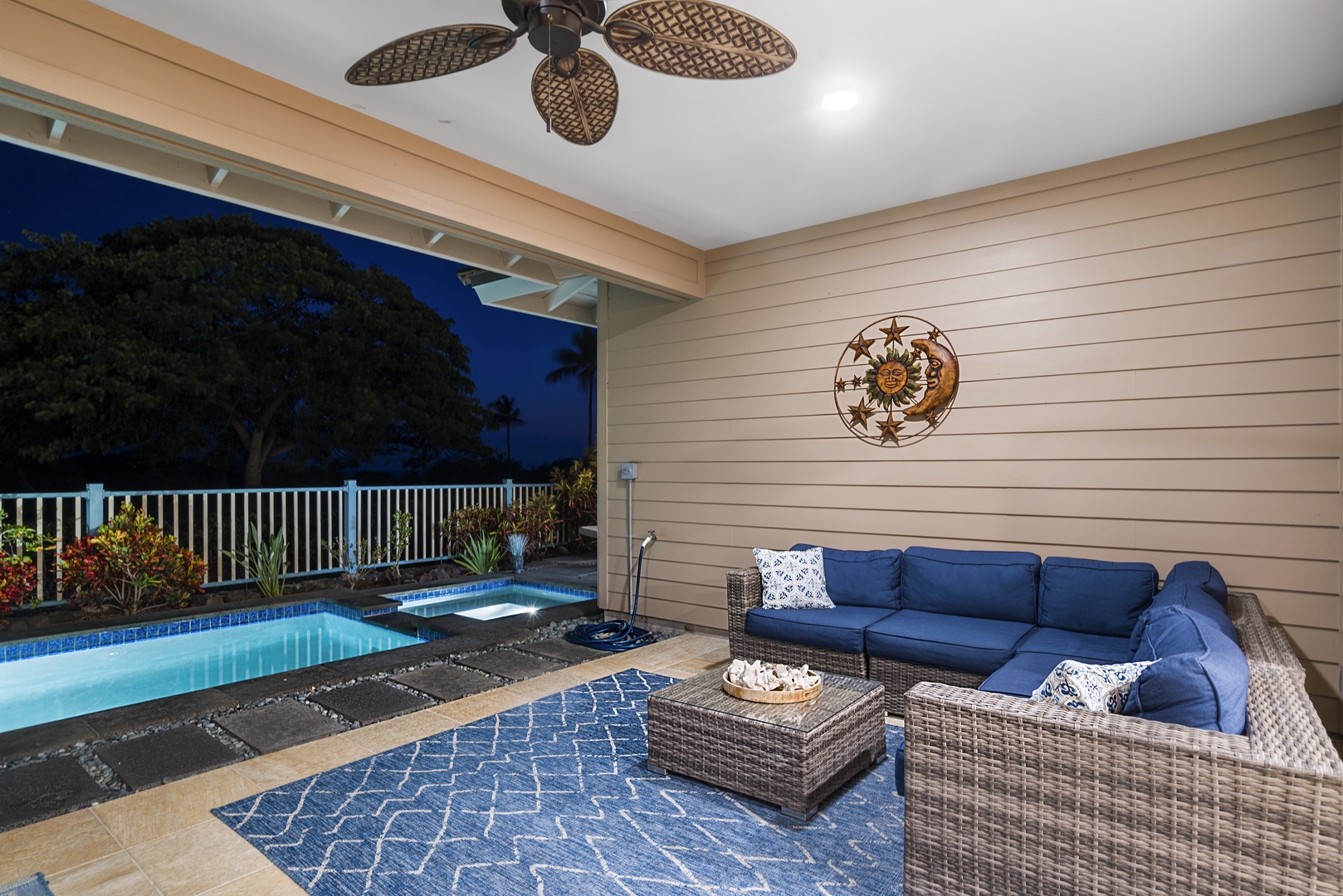 Kailua Kona Vacation Rentals, Kona Blue Vacations Holua Kai - Covered lanai offers shaded poolside seating with ceiling fans, ideal for sipping chilled wine or reading in comfort.