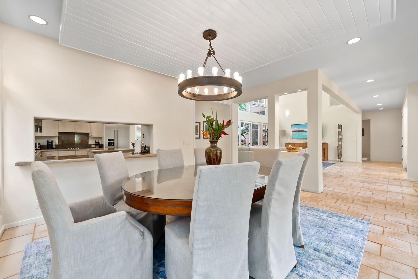Honolulu Vacation Rentals, Diamond Head Luxe - Gather around this elegant dining table where memorable meals await beneath stunning lighting and open-concept design.