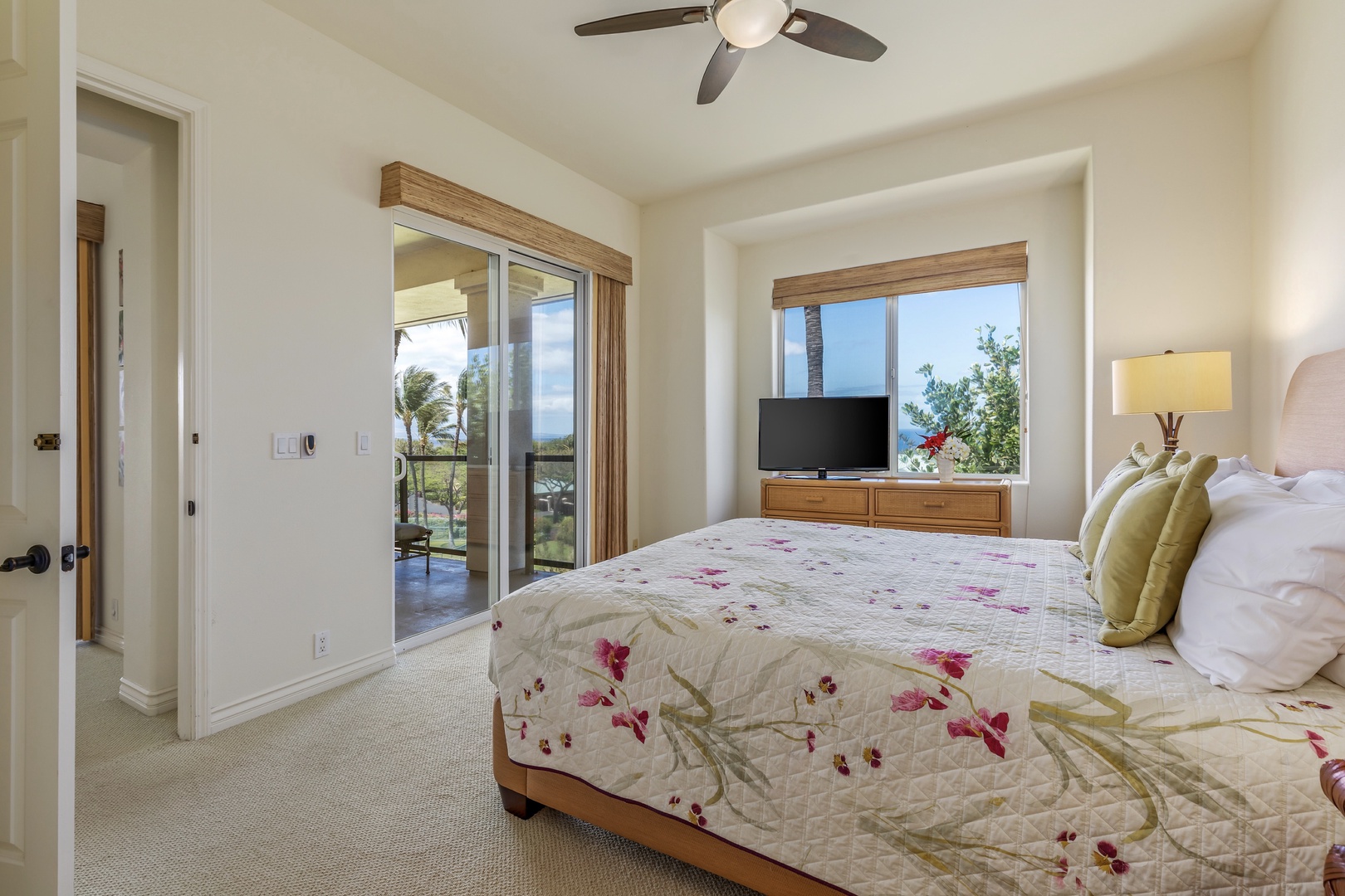 Kamuela Vacation Rentals, 2BD Kumulani (I-4) at Mauna Kea Resort - Spacious primary bedroom with ocean views, lanai access and en suite bath.