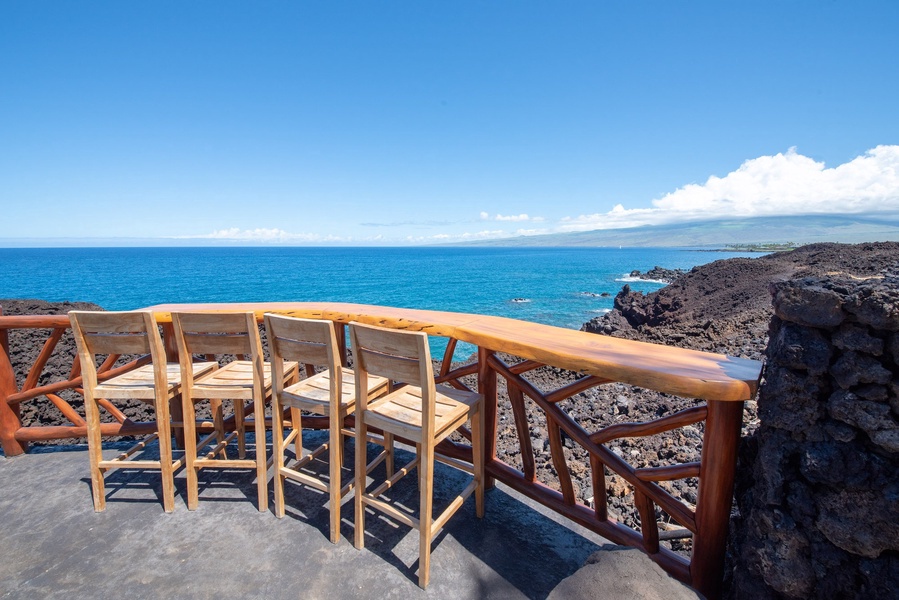 Kamuela Vacation Rentals, 6BD Mauna Lani Lux Golf Estate (5) at One Ocean - The Ocean Club Amenity Center offers seating to take in the views or enjoy seasonal whale watching