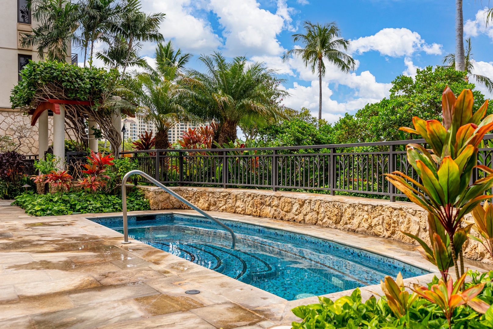 Kapolei Vacation Rentals, Ko Olina Beach Villas B109 - A quieter pool backed by rock and planting, set off from the main deck.