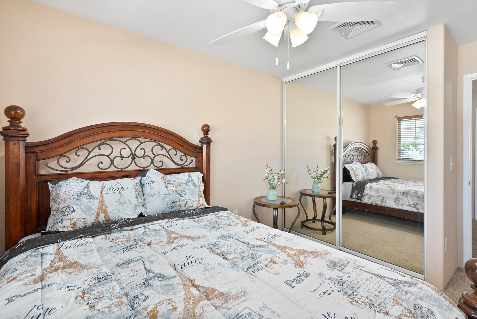 Kapolei Vacation Rentals, Kilipue Retreat - Spacious guest bedroom with mirrored closet doors for easy storage.