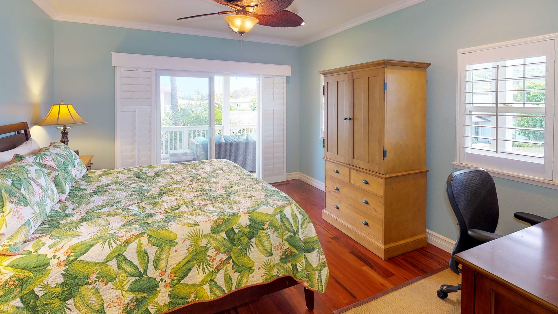 Kapolei Vacation Rentals, Coconut Plantation 1200-4 - The guest room with ceiling fan and private lanai.
