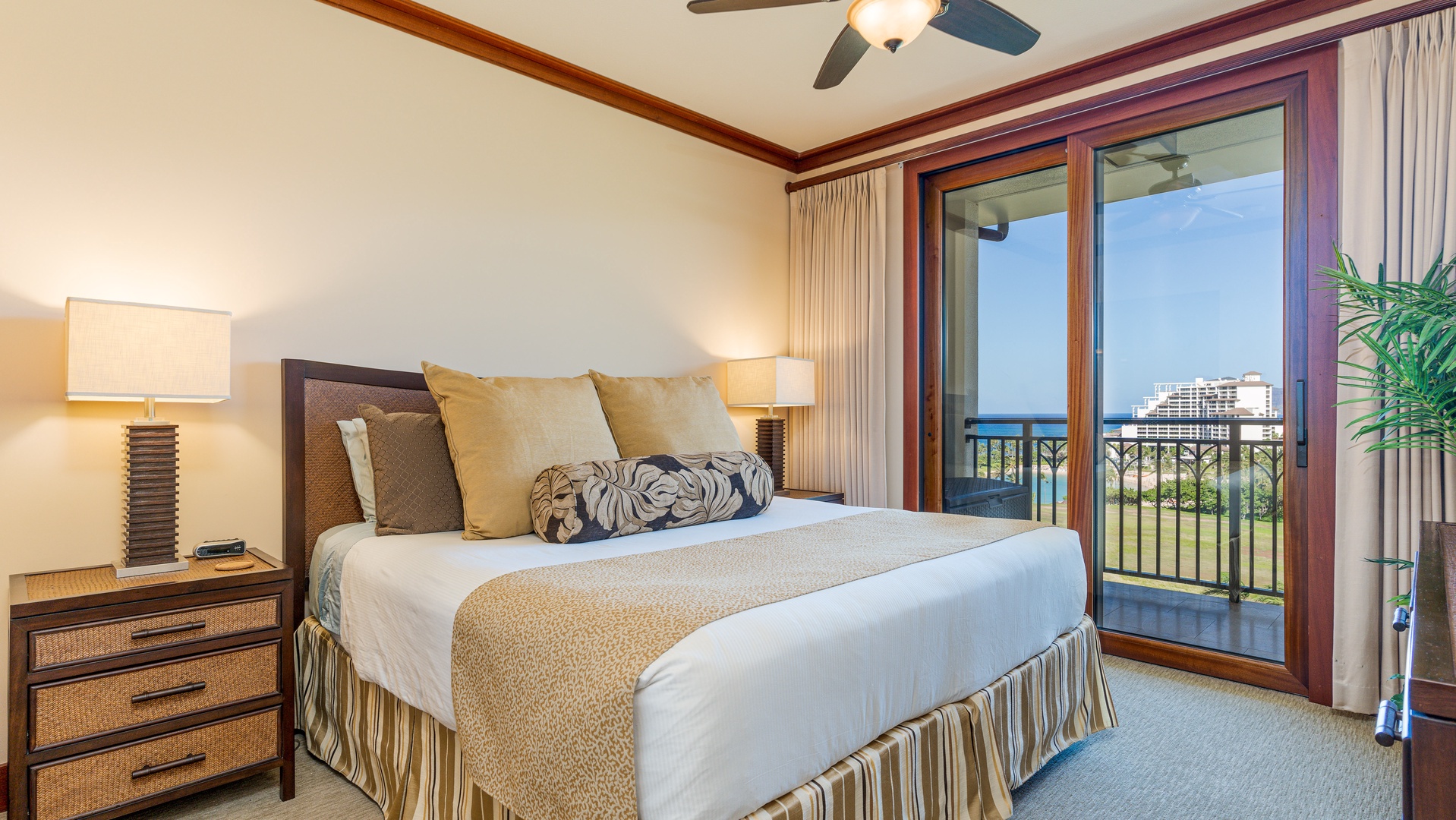 Kapolei Vacation Rentals, Ko Olina Beach Villas B1101 - The primary guest bedroom with a king bed and incredible views.