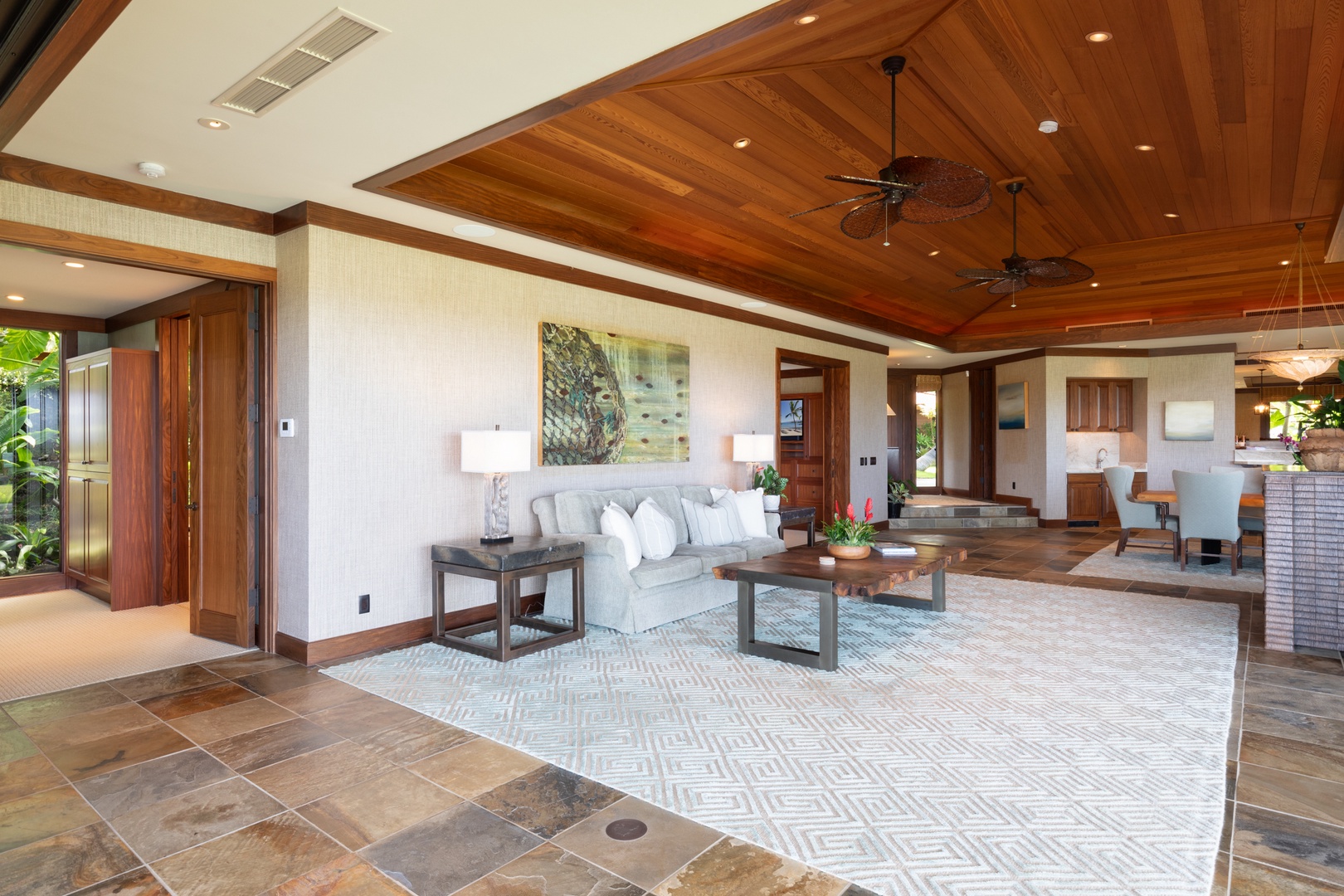 Kailua Kona Vacation Rentals, 5BD Ke Alaula Estate (144) at Hualalai Resort - Spacious living area with elegant stone floors and custom woodwork.
