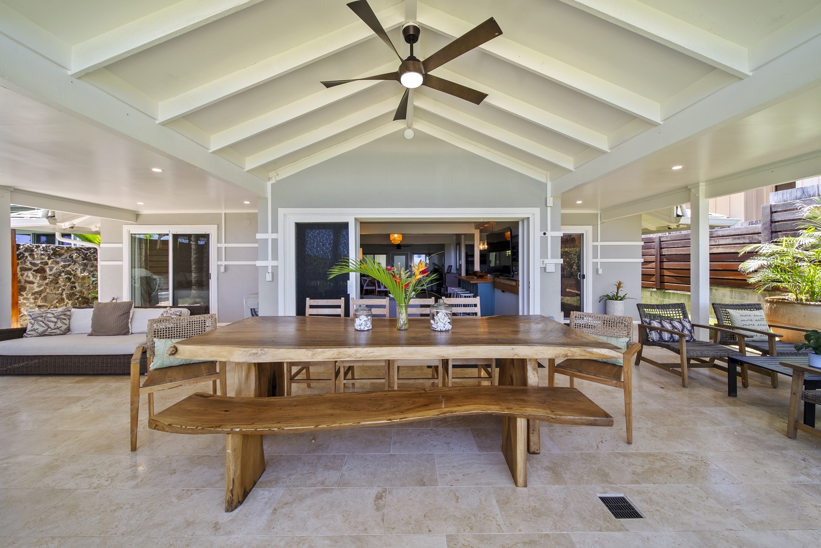 Haleiwa Vacation Rentals, Hale Nalu - Spacious lanai with fans and seating, perfect for island-style dinners.