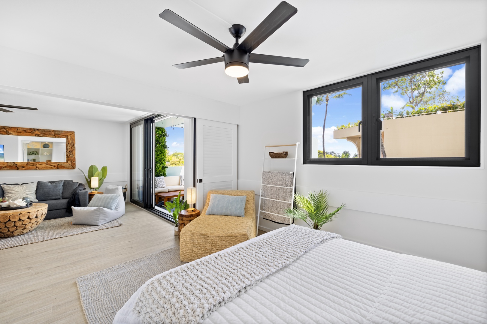 Honolulu Vacation Rentals, Hale Pono Waikiki - Relax in this spacious bedroom with a comfortable bed, refreshing natural light, and direct access to the inviting lanai.