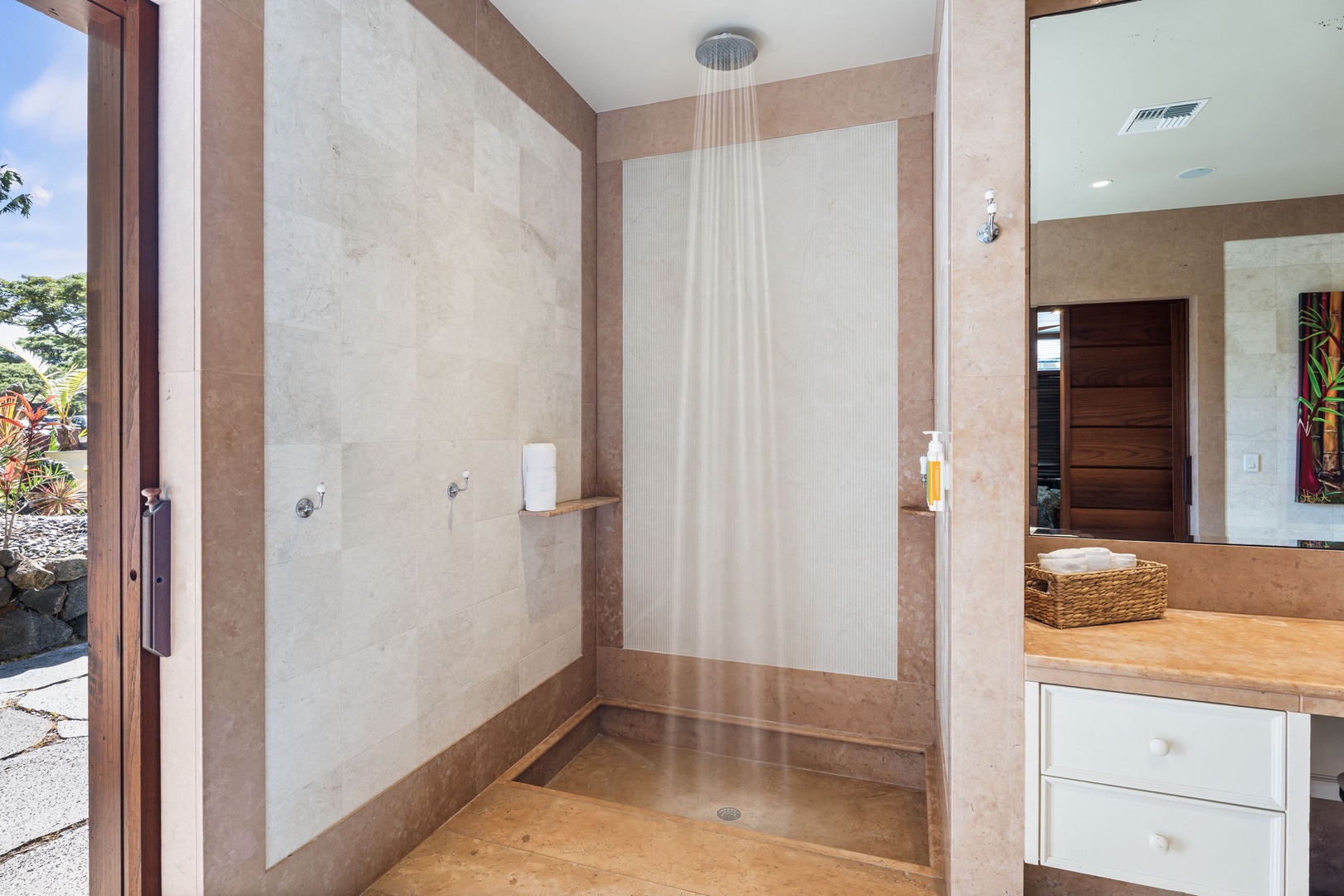 Kailua-Kona Vacation Rentals, Hahalua Bay Villa - Step into your private rainfall shower sanctuary with marble walls and garden views through floor-to-ceiling windows.
