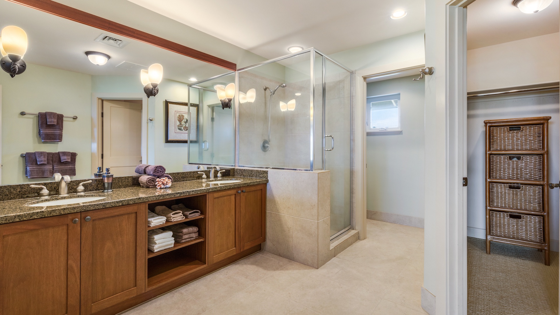 Waikoloa Vacation Rentals, 3BD Hali'i Kai (12G) at Waikoloa Resort - Primary bath w/ walk-in shower and dual sinks, separate toilet room and walk-in closet.