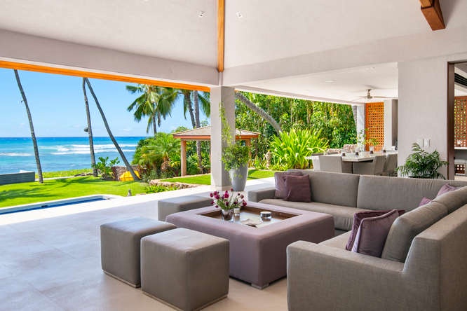 Honolulu Vacation Rentals, Diamond Head Beachfront Estate - Covered outdoor lounge with plush seating and sweeping ocean views—perfect from sunrise to sunset.
