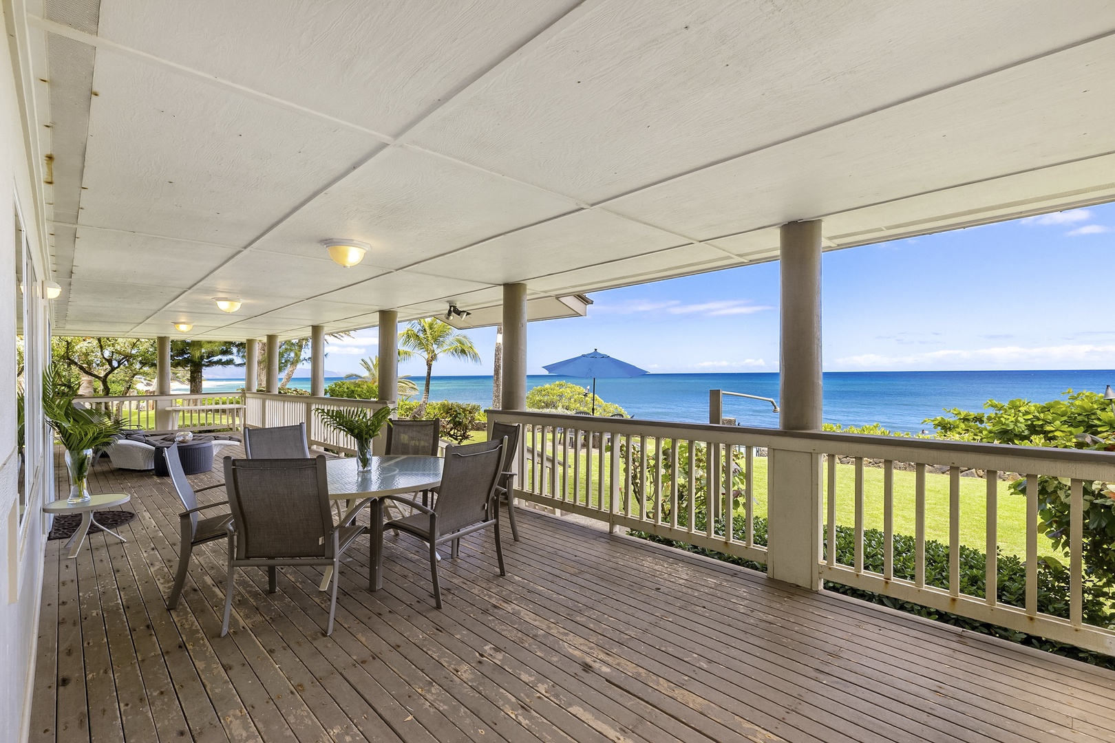 Haleiwa Vacation Rentals, Hale Kimo - Relax and enjoy the Pacific ocean views from the covered lanai.