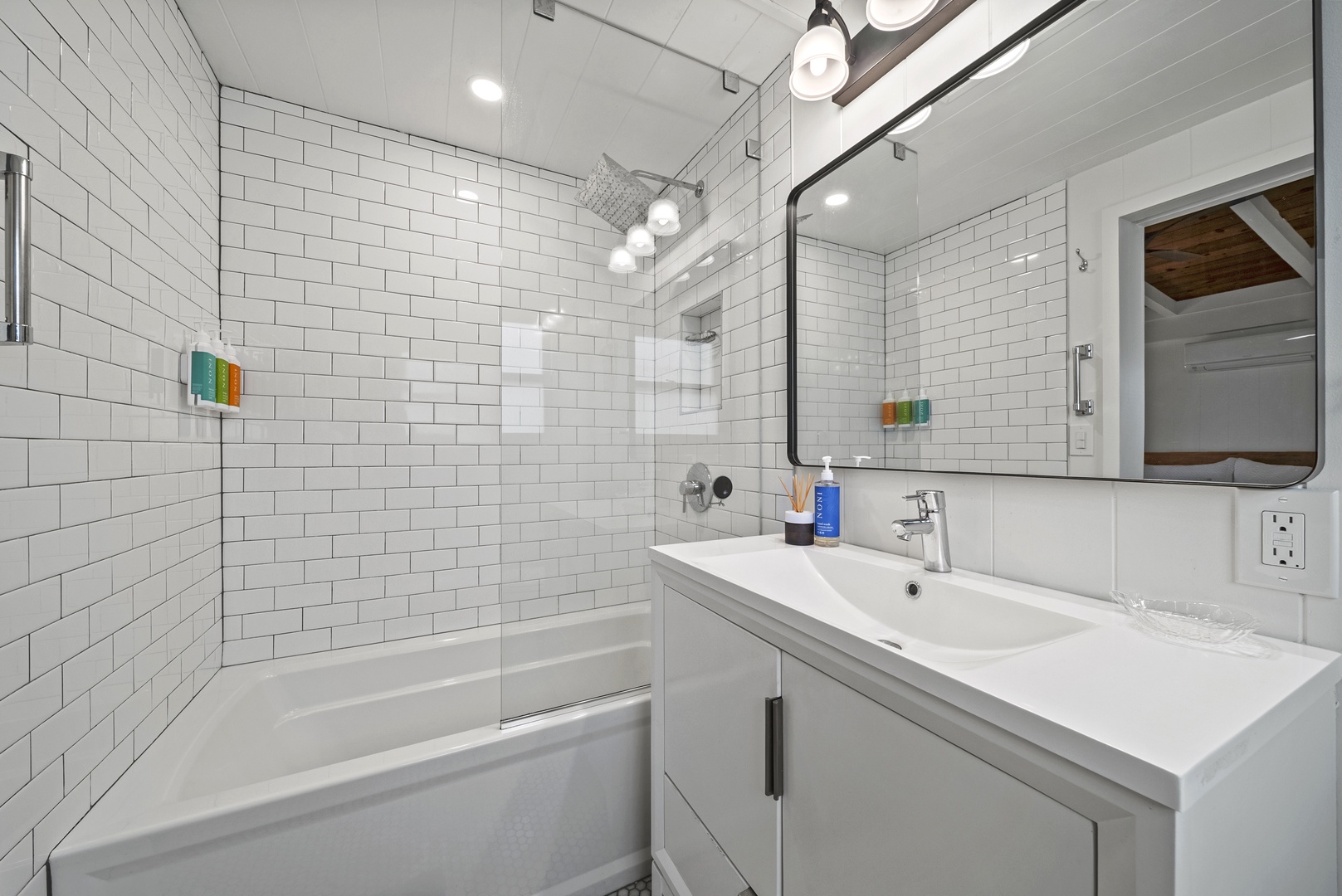 Haleiwa Vacation Rentals, Surfer's Paradise - Crisp, newly updated shower with subway tile and clean finishes, offering a spa-like feel for guests.