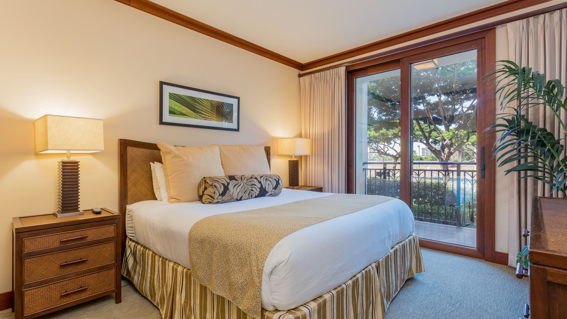 Kapolei Vacation Rentals, Ko Olina Beach Villas B202 - The primary guest bedroom with comfortable decor and breathtaking views when you wake up.