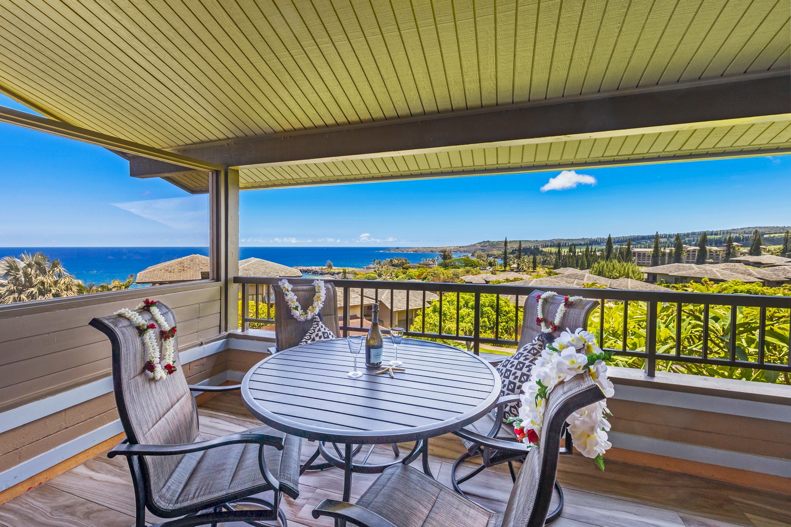 Lahaina Vacation Rentals, Kapalua Ridge 1421 - Enjoy your meals or a glass of wine on the lanai, with sweeping views of the ocean and tropical landscape.