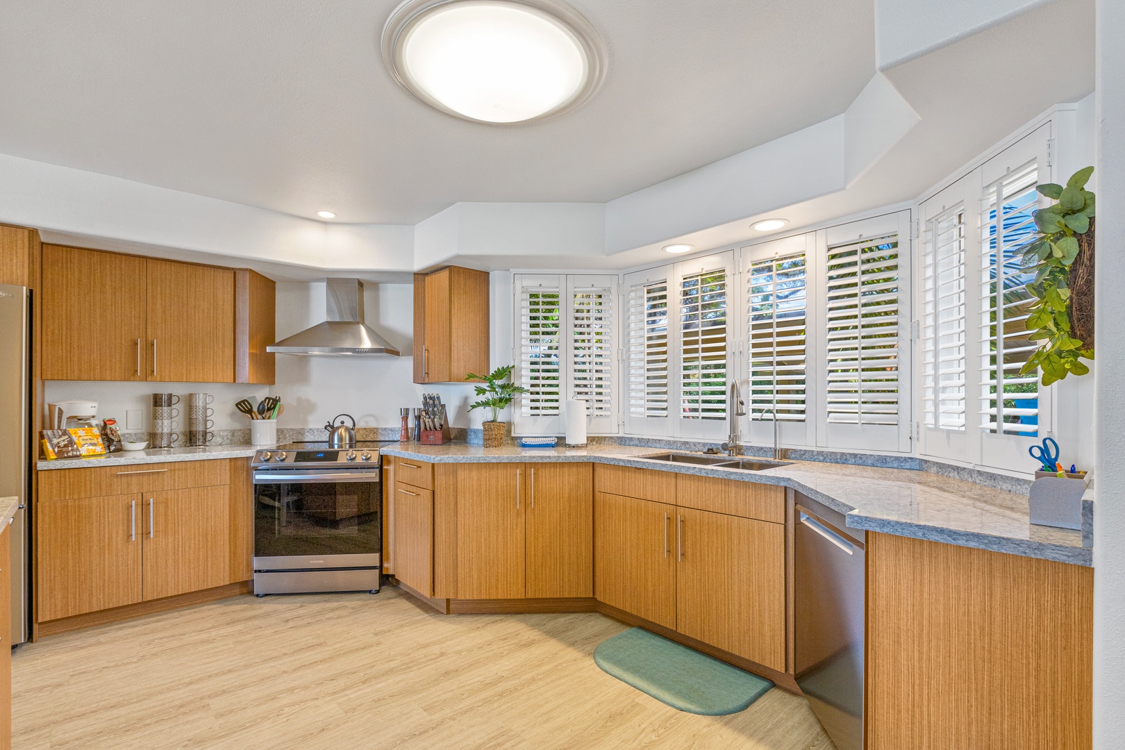 Lahaina Vacation Rentals, Puamana 254-2 - The kitchen at Puamana 254-2 is equipped with sleek stainless steel appliances for modern convenience.