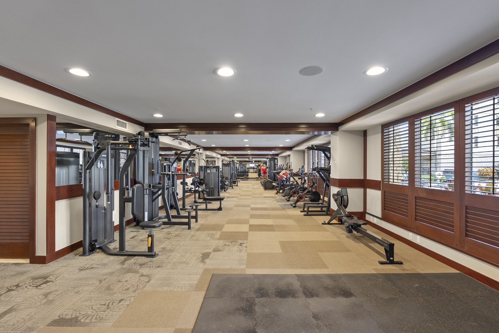Get the morning workout in before the beach, a full row of machines and the light coming in.