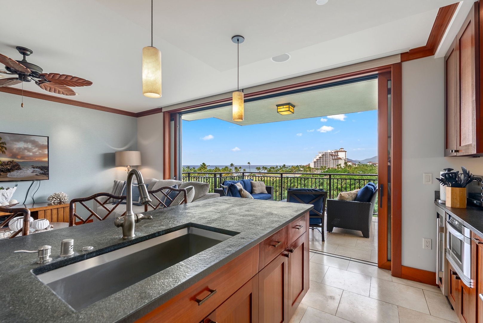 Kapolei Vacation Rentals, Ko Olina Beach Villas B604 - Your gourmet kitchen flows seamlessly to the lanai, where granite counters meet tropical breezes and stunning resort views create the perfect cooking backdrop.