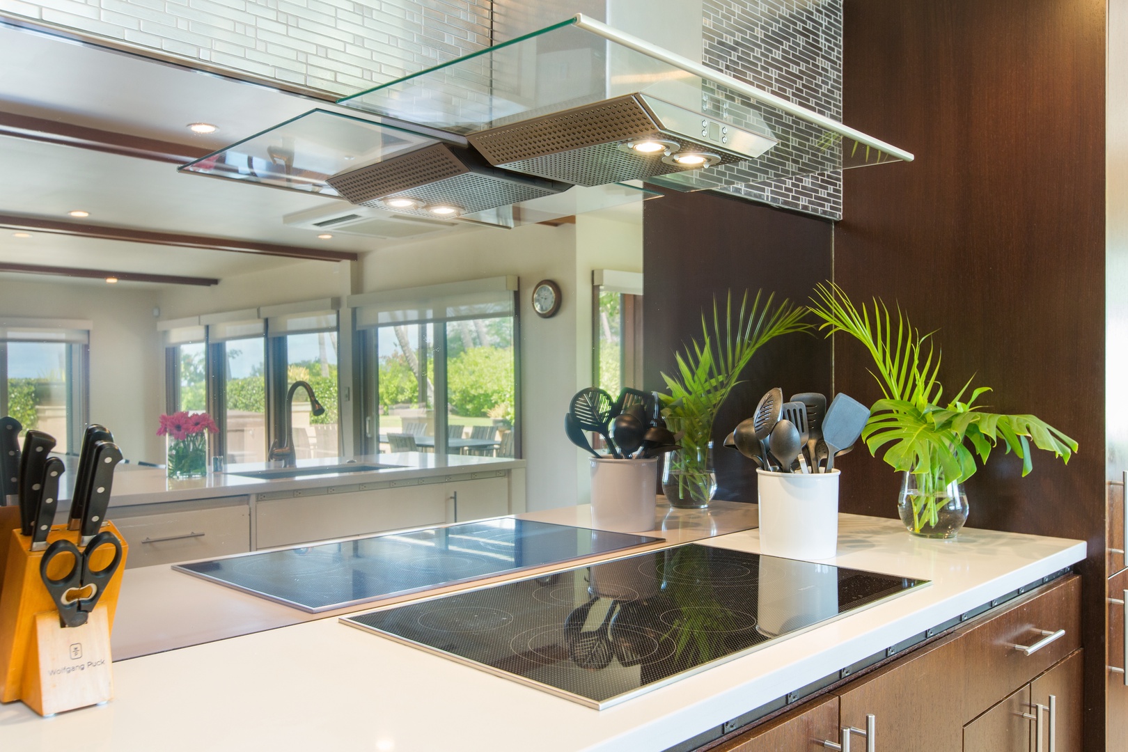 Honolulu Vacation Rentals, Kahala Mini Resort (5BR) - Prep space runs long here, framed by garden green through the kitchen windows.