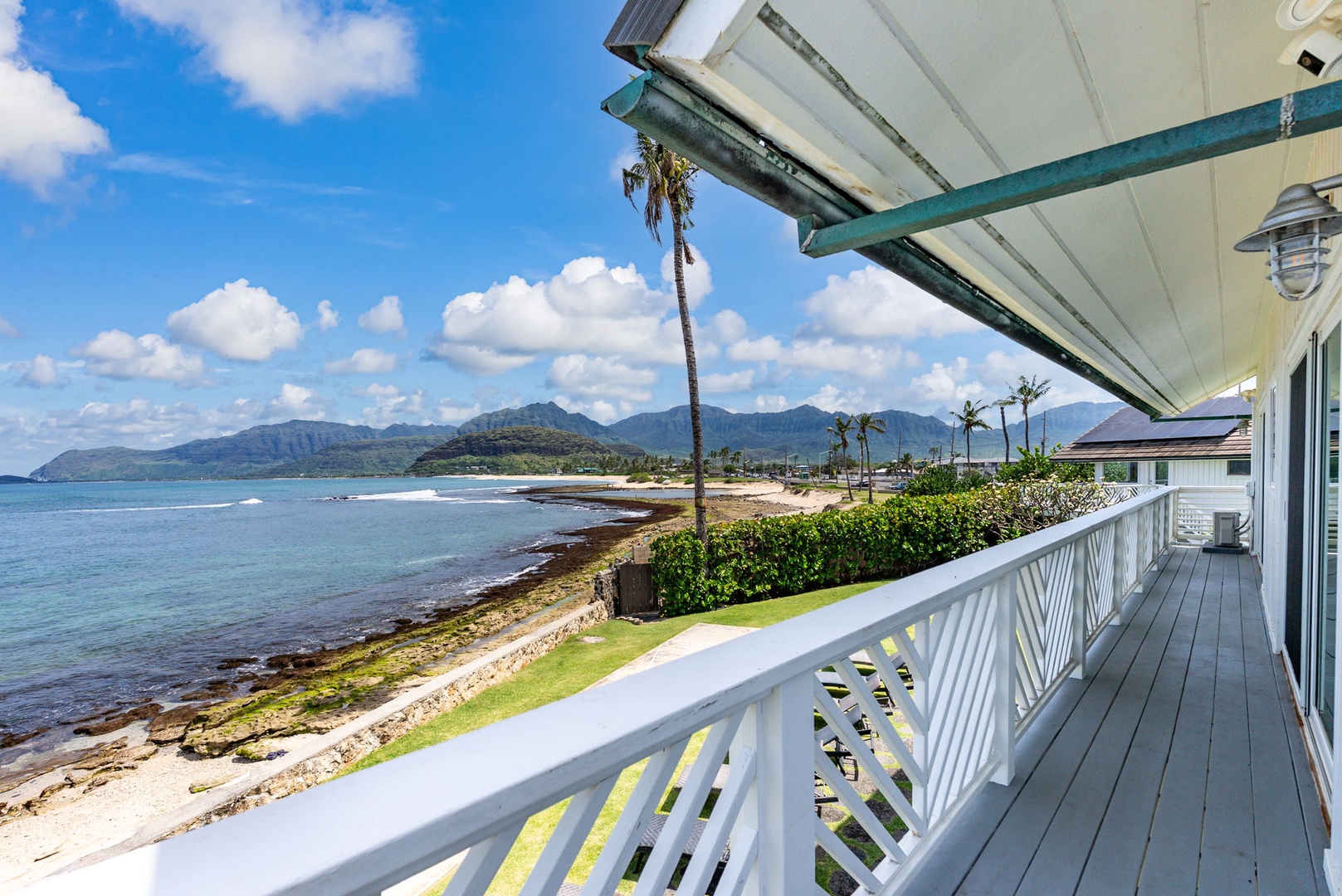 Waianae Vacation Rentals, Ma'ili Blue Estate - Step onto your oceanfront balcony where gentle trade winds carry the sound of waves and sweeping views stretch across pristine coastline.