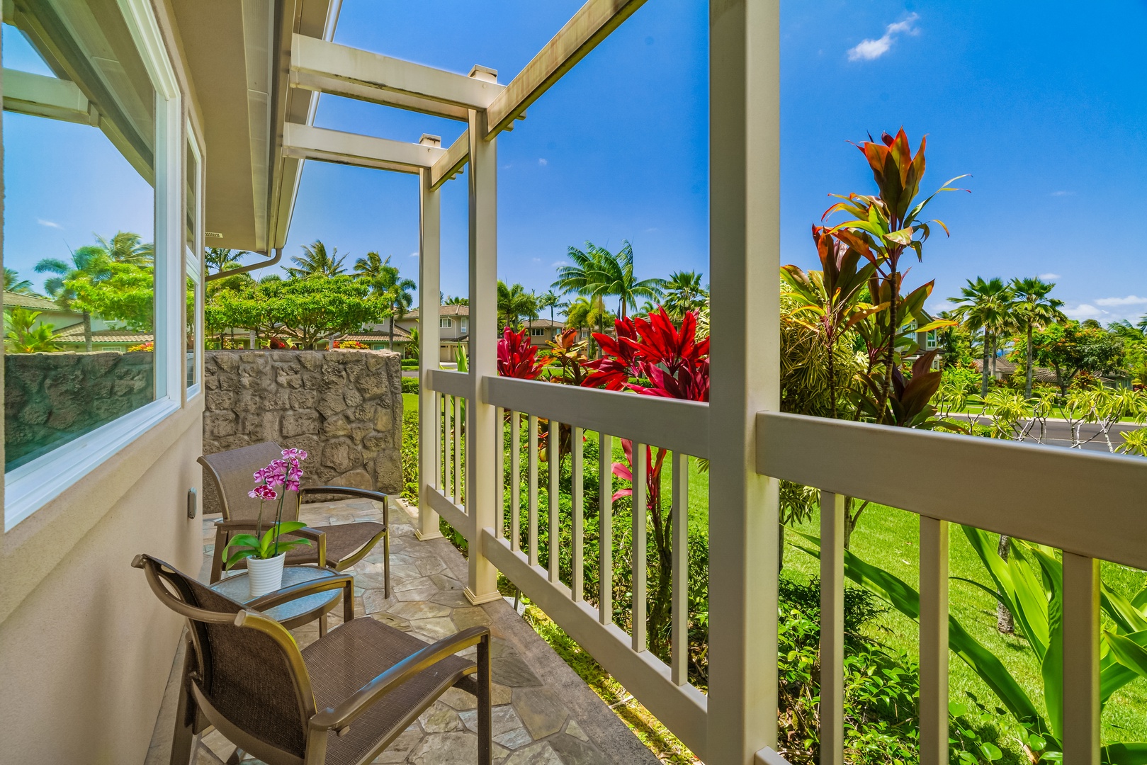 Princeville Vacation Rentals, Noelani Kai - Unwind on our spacious balcony, an ideal perch to enjoy tranquil moments and soak in the stunning views.