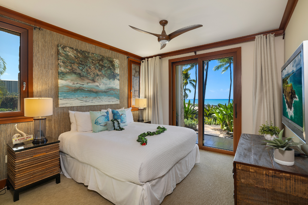 Kapolei Vacation Rentals, Ko Olina Beach Villas B109 - Enjoy sunset views from the private primary suite with fan and flat screen tv.