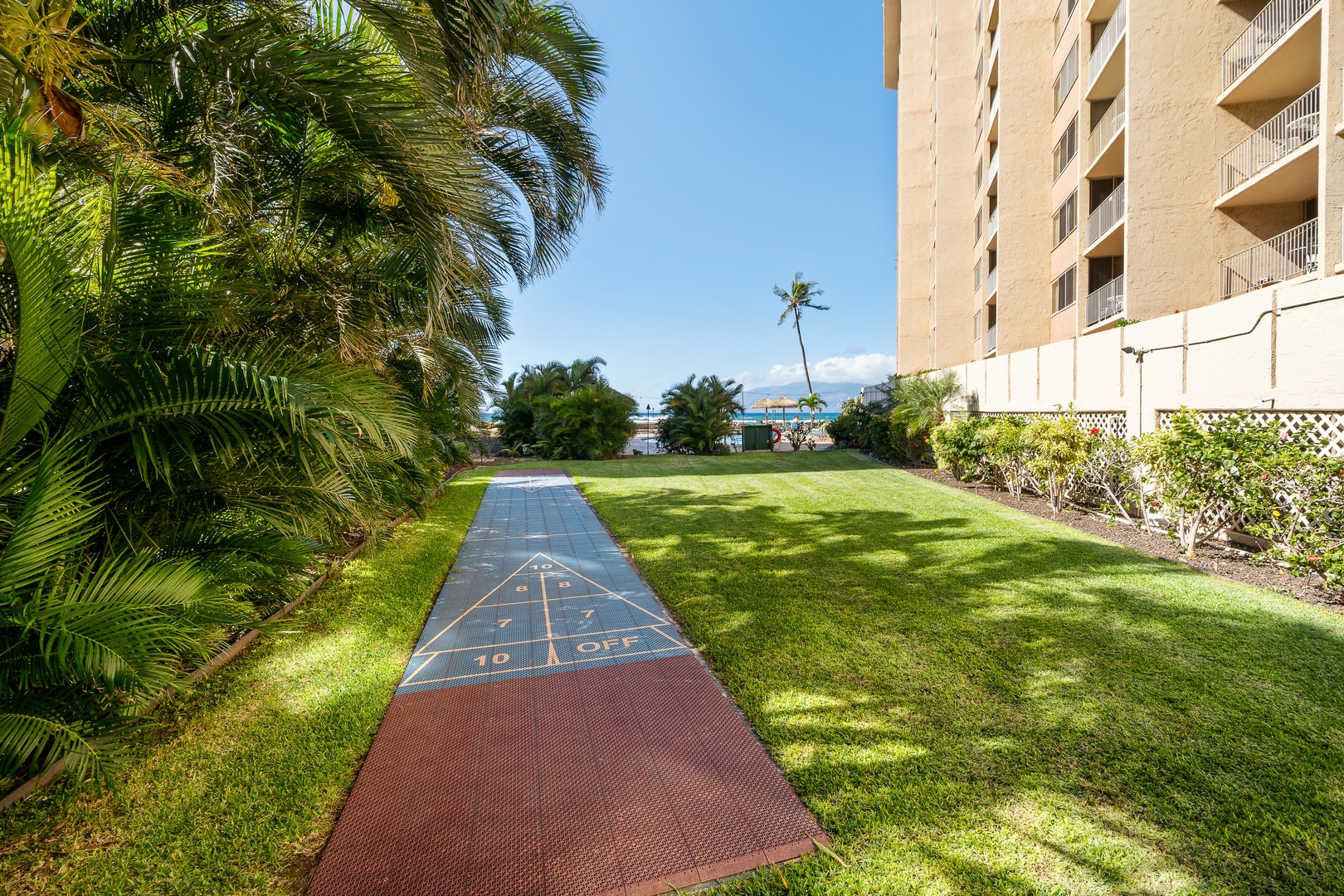 Lahaina Vacation Rentals, Royal Kahana 308 - Play and unwind by the lawn at Royal Kahana 308’s fun outdoor game area.