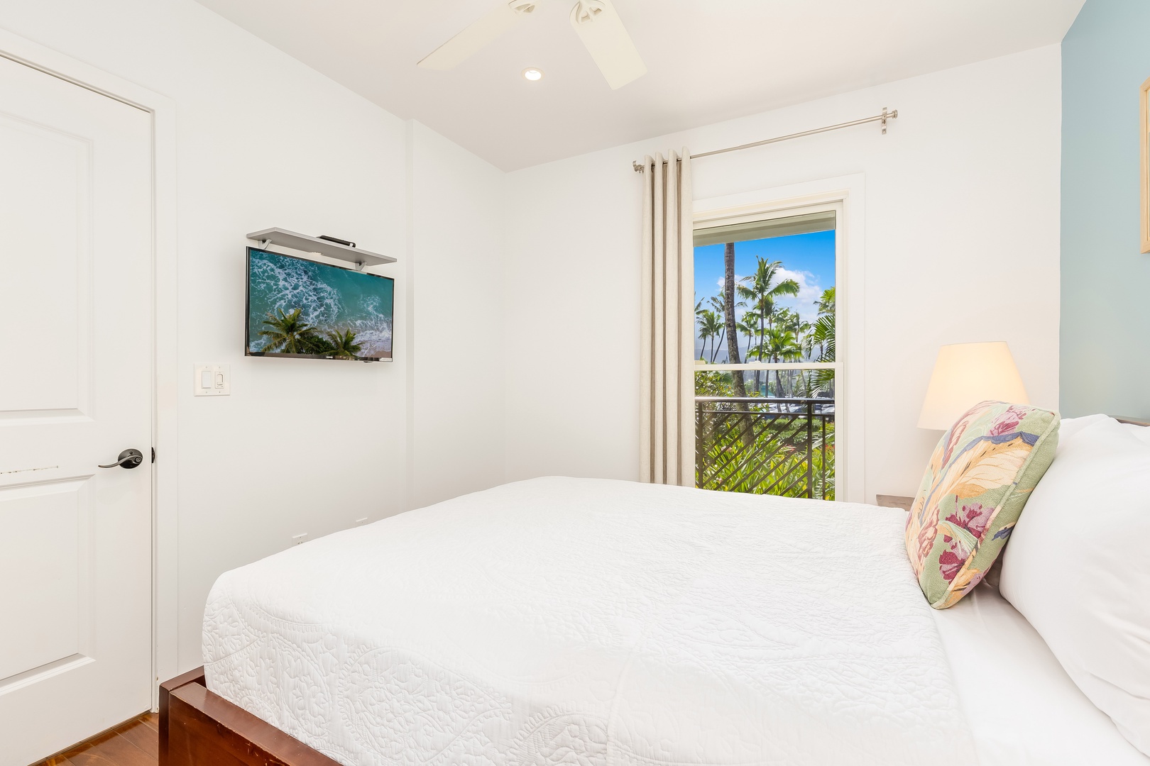 Kahuku Vacation Rentals, Turtle Bay Villas 209 - Wake up to tropical paradise views from your comfortable bed, where swaying palms frame the perfect Hawaiian morning.