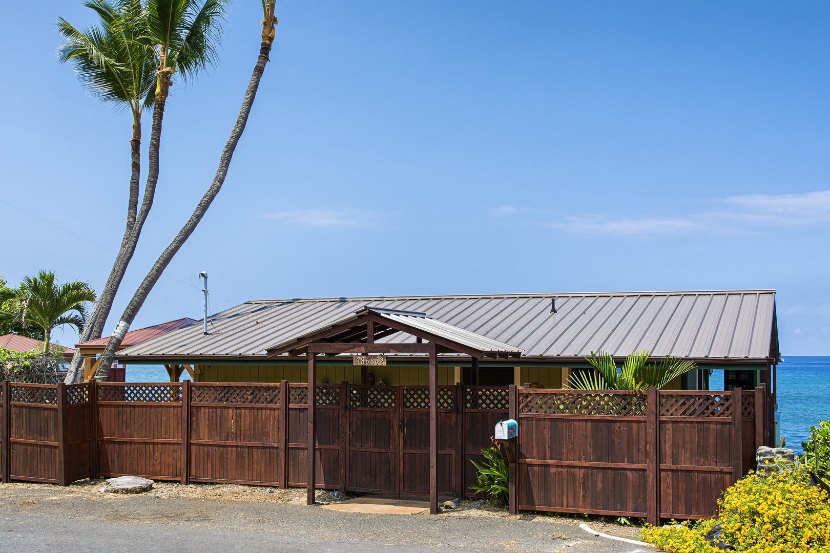 Kailua Kona Vacation Rentals, The Cottage - Frontage of the home from Ali'i Drive