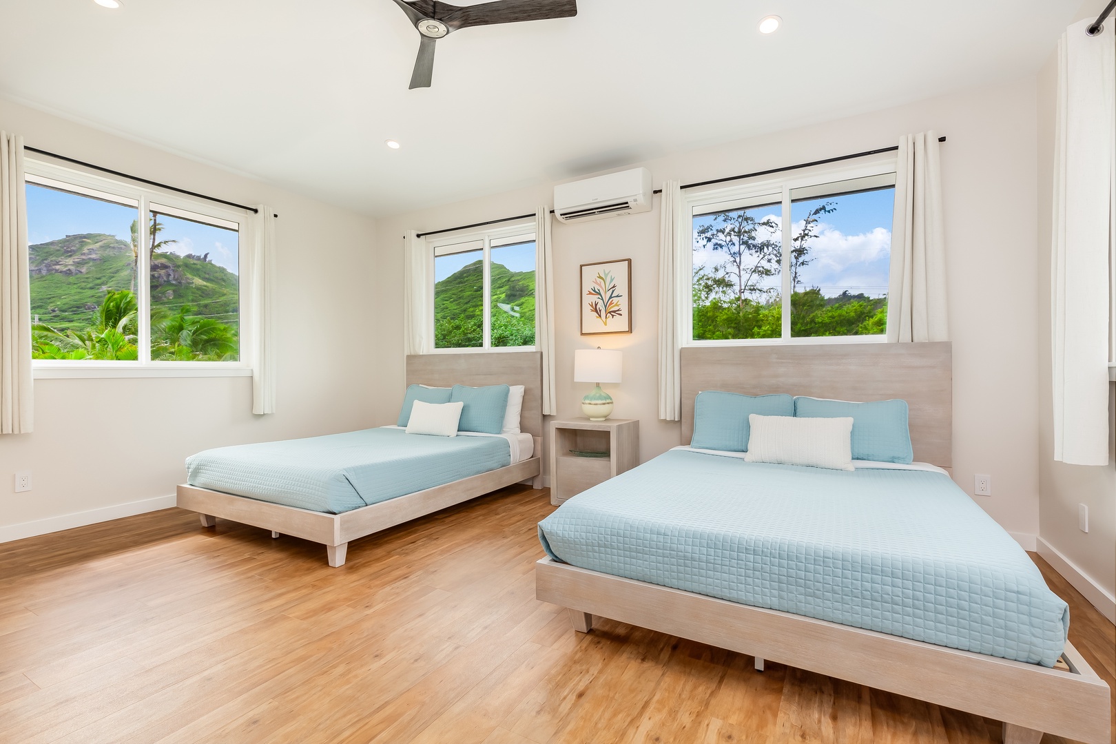 Laie Vacation Rentals, Majestic Mahakea Oceanfront Oasis - Double fourth guest bedroom with twin beds, ideal for families or children seeking comfort.