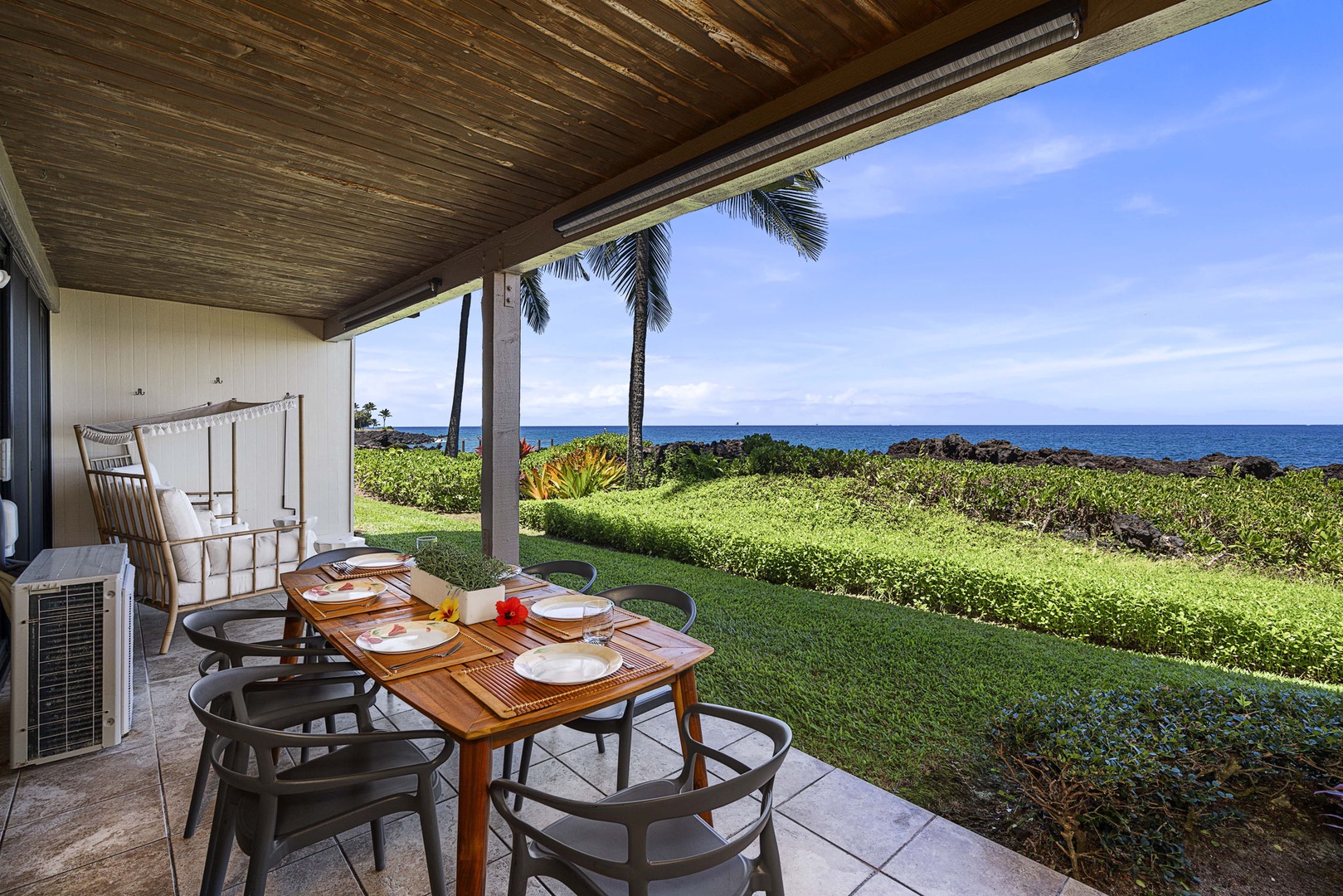 Kailua Kona Vacation Rentals, Keauhou Kona Surf & Racquet 1104 - Savor al-fresco dining at the lanai, where the gentle breeze complements every bite under the starlit sky.