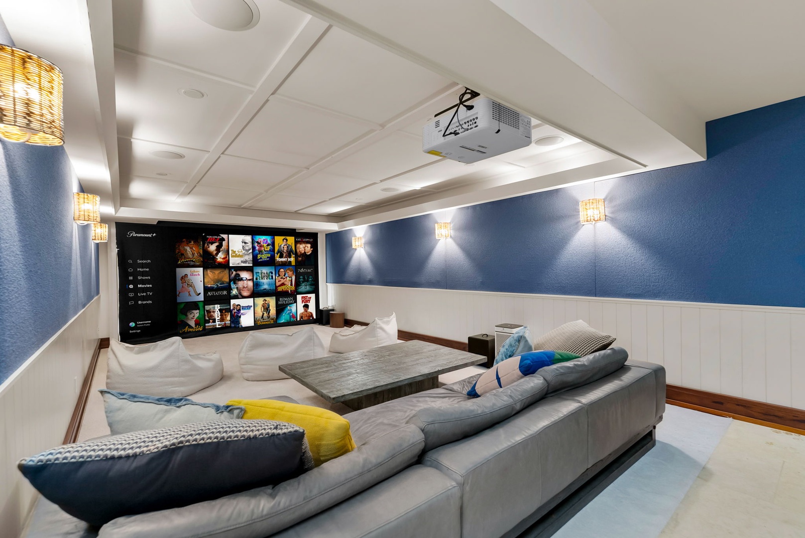 Kailua Vacation Rentals, Leaf House - Sink into plush seating and enjoy your favorite films on the big screen in this cozy home theater, designed for ultimate relaxation and entertainment.