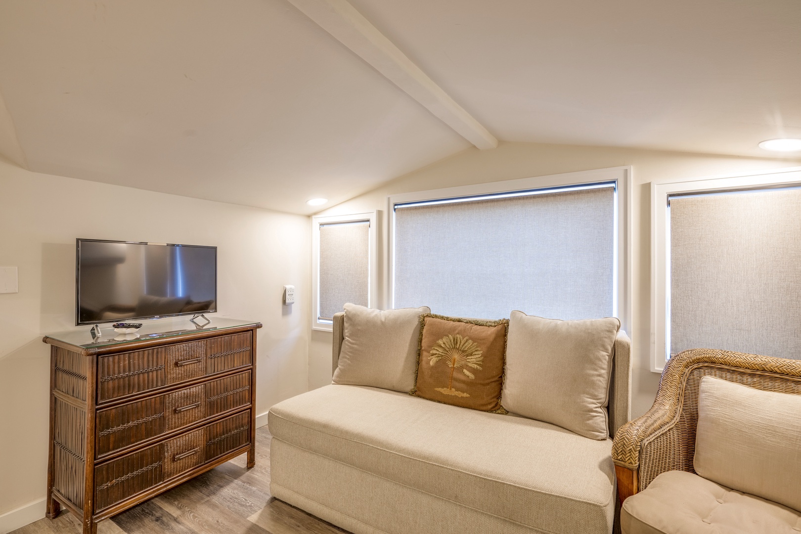 Lahaina Vacation Rentals, Puamana 240-3 - Relax in a well-lit bedroom featuring a king bed and a full size sleeper sofa.
