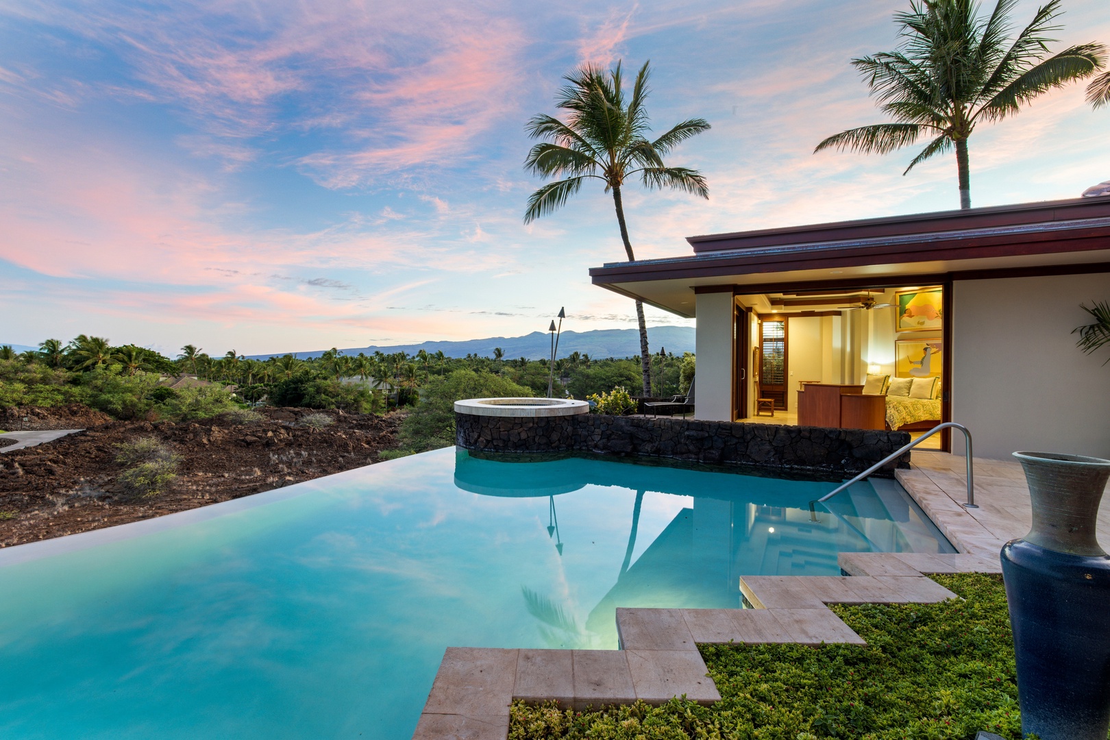 Kamuela Vacation Rentals, Champion Ridge 7 - Evenings invite you to float, sip, and unwind by the glowing spa and starlit pool deck.