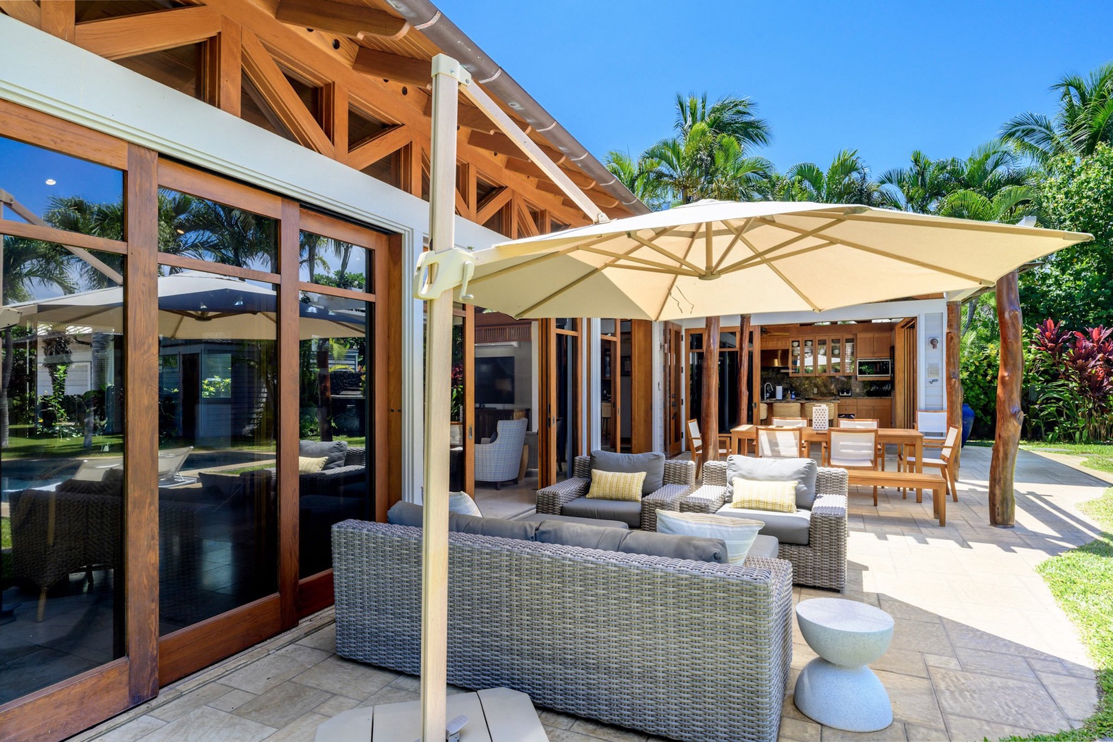 Kamuela Vacation Rentals, 3BD Na Hale 3 at Pauoa Beach Club at Mauna Lani Resort - Enjoy the outdoor lanai seating, a perfect spot to gather, dine, and relax.
