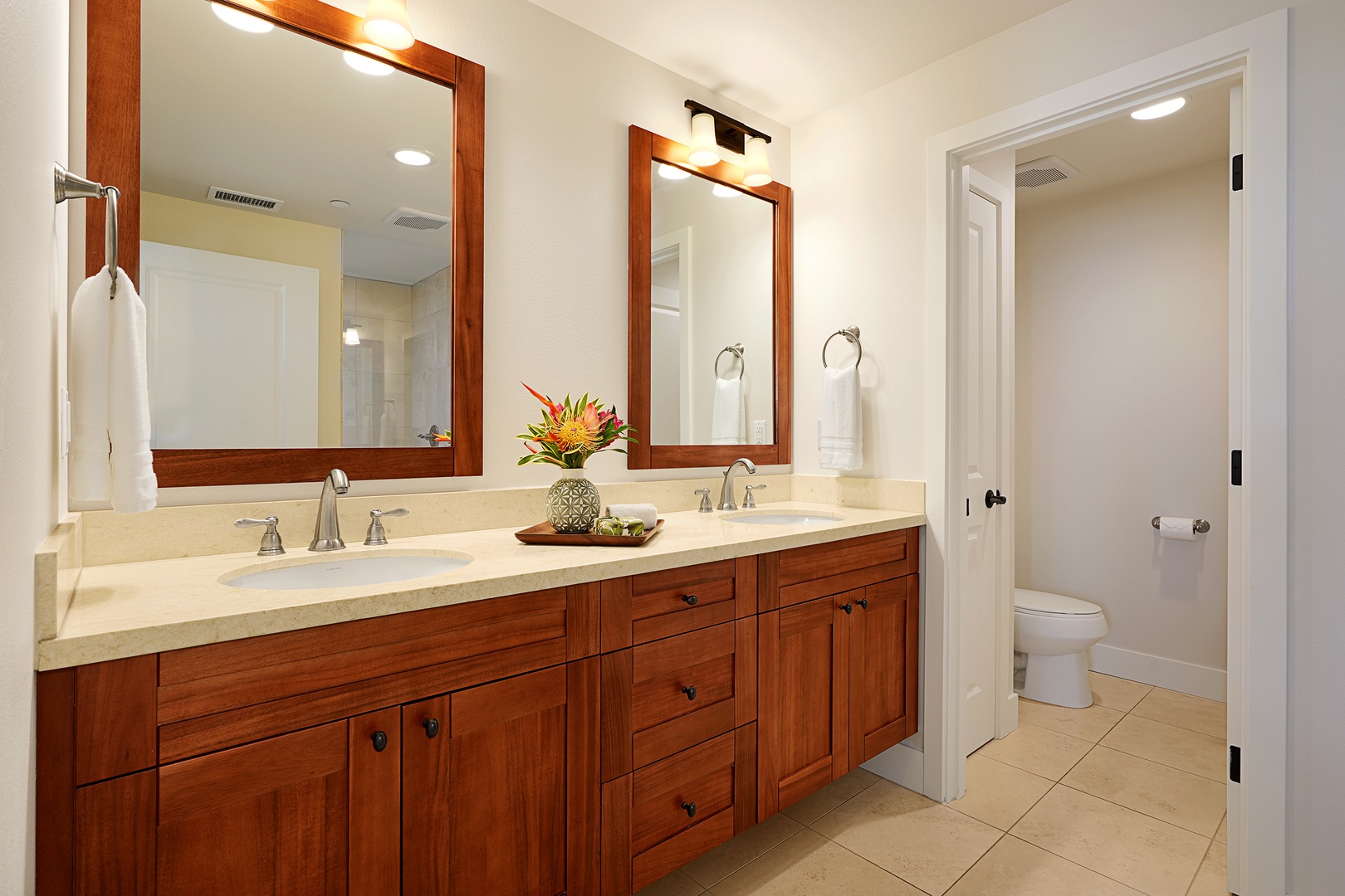 Koloa Vacation Rentals, Pili Mai 14K - Pamper yourself in the luxurious bathroom with double sinks and a spacious vanity.