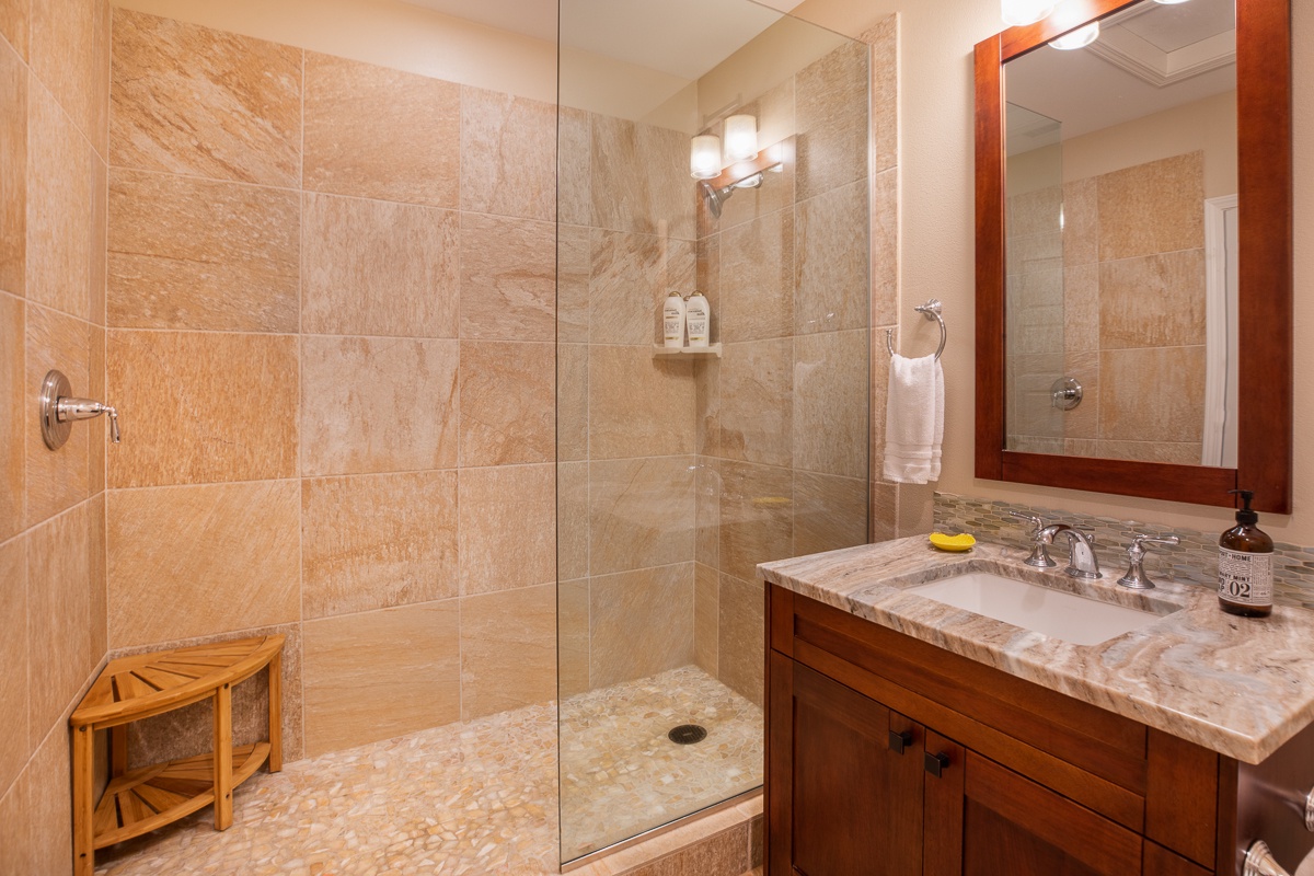 Kamuela Vacation Rentals, Mauna Lani KaMilo #123 - Ensuite bathroom with a walk-in shower