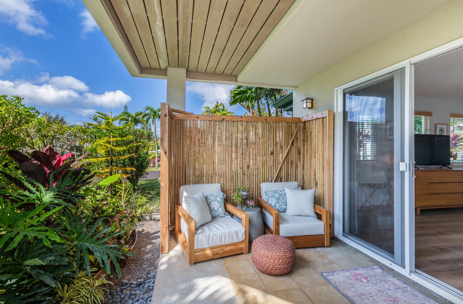 Princeville Vacation Rentals, Sea Glass - Cozy lanai corner, the perfect space for relaxation and privacy.