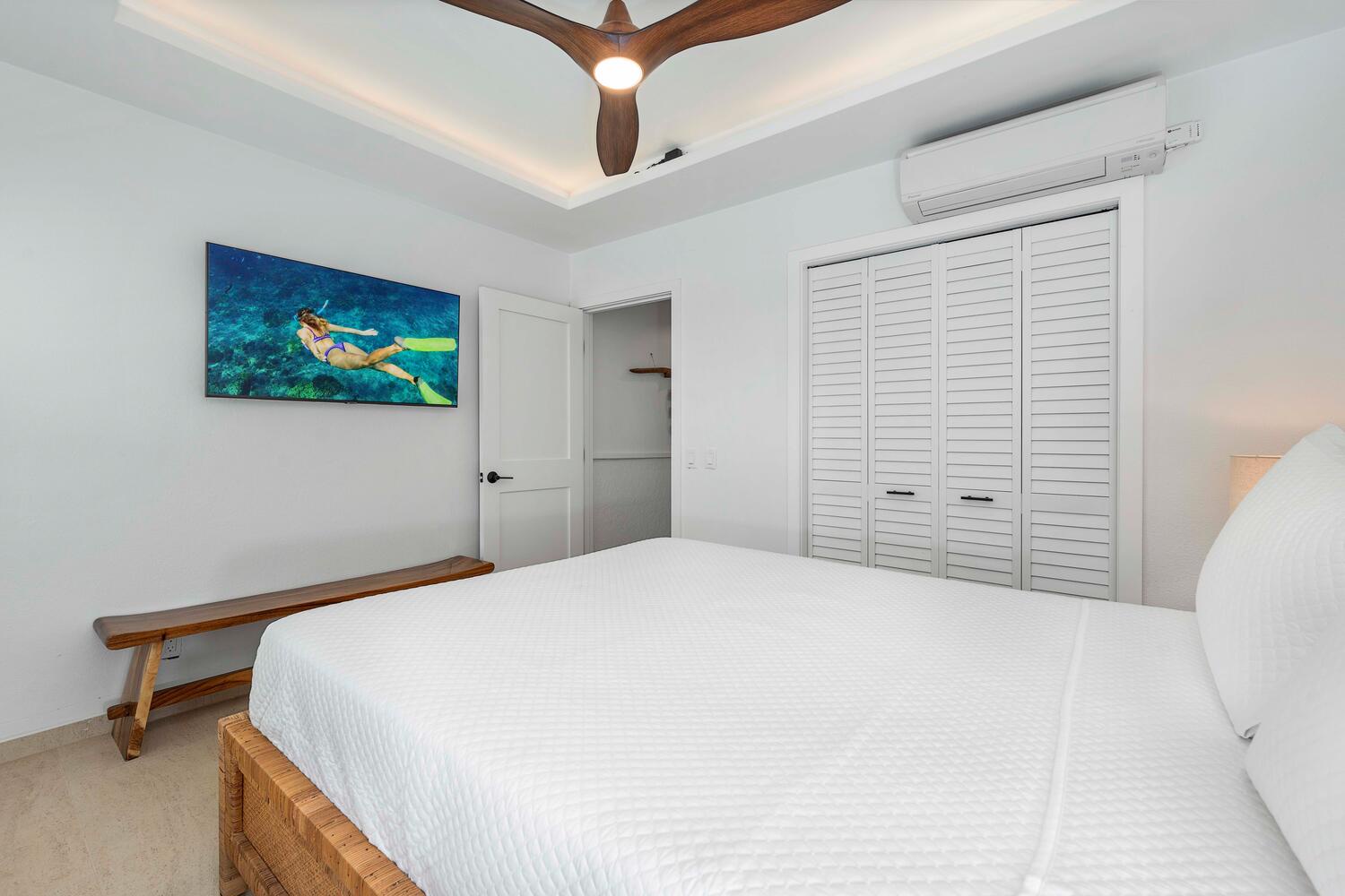 Kailua Kona Vacation Rentals, Manukai Hale - The second guest bedroom features a queen-sized bed, TV and ensuite bathroom.