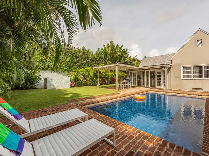 Honolulu Vacation Rentals, Ho'okipa Villa - Relax poolside in the backyard with a peaceful view of Ho'okipa Villa main house.