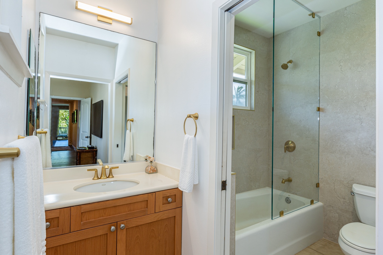 Princeville Vacation Rentals, Pualani Villa - Elegant vanity with a large mirror, perfect for getting ready in style.