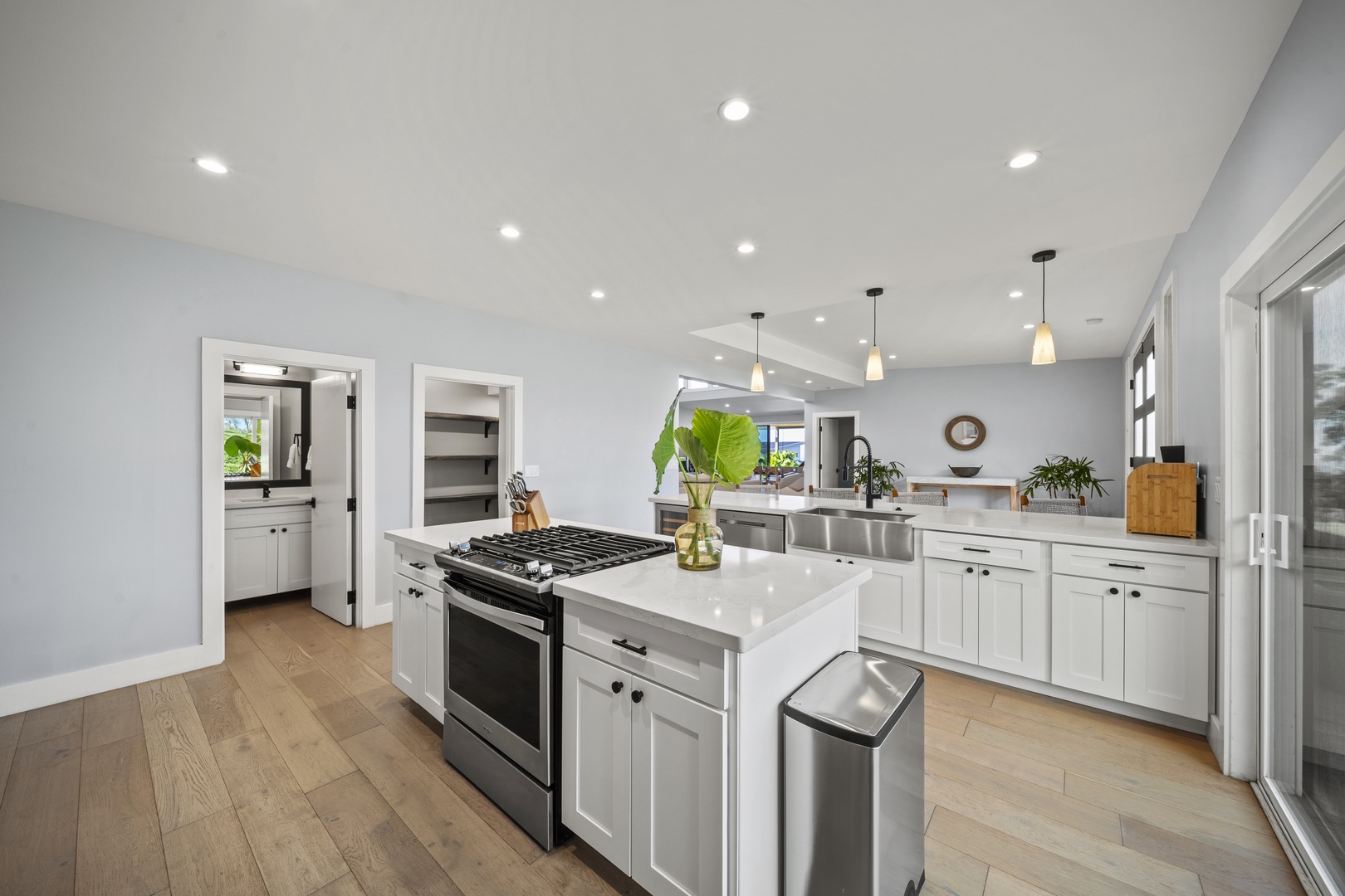 Haleiwa Vacation Rentals, Hale Mahina - Cook and connect in the gourmet kitchen with a large island, gas range, and space for everyone to gather.