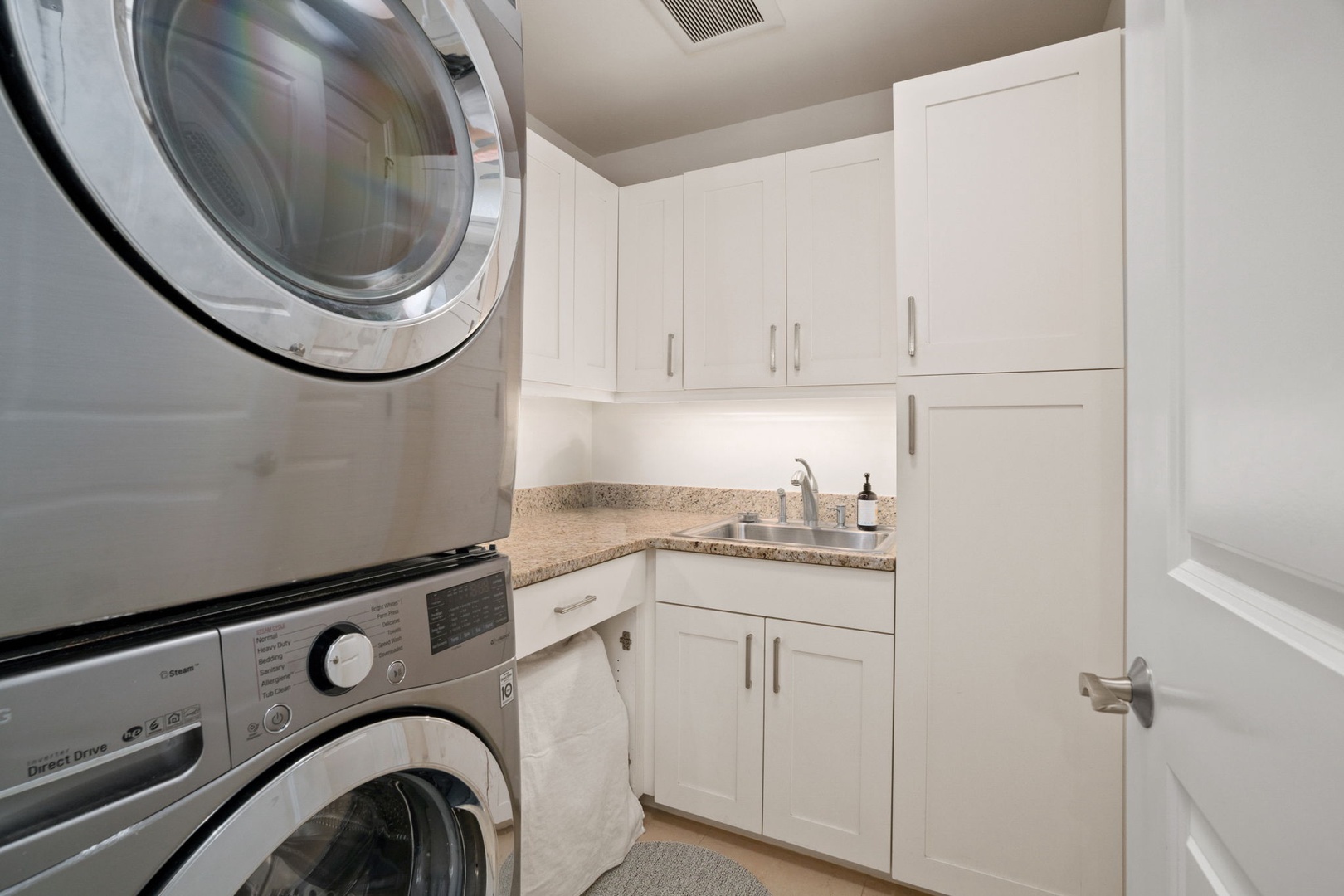 Princeville Vacation Rentals, Kaiulani #8 - Run a load of sandy towels in the stacked washer and dryer without leaving home.