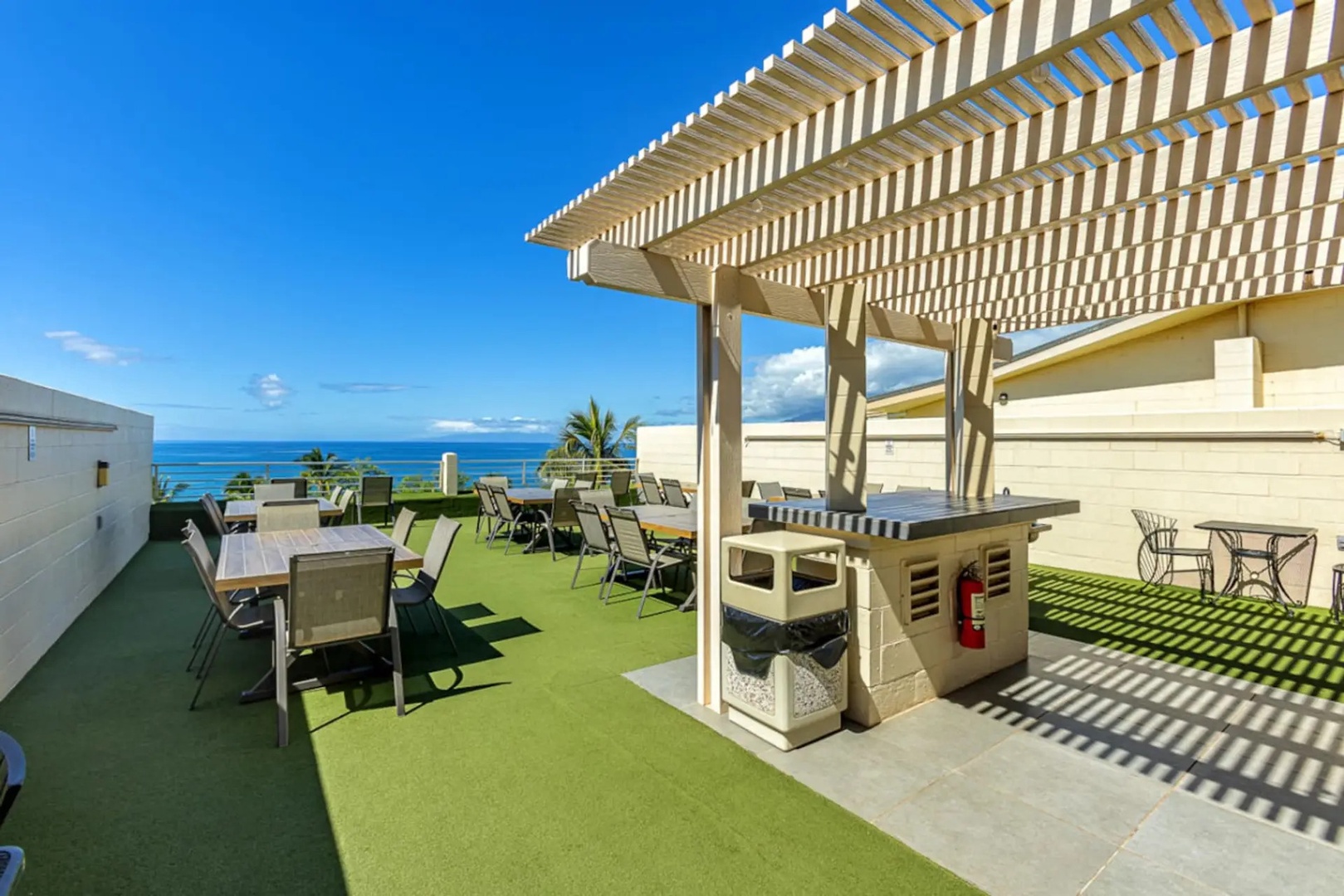 Kihei Vacation Rentals, Kamaole Beach Royal 610 - Fire up the rooftop grill under its own pergola, then walk the plates straight to the tables beyond.